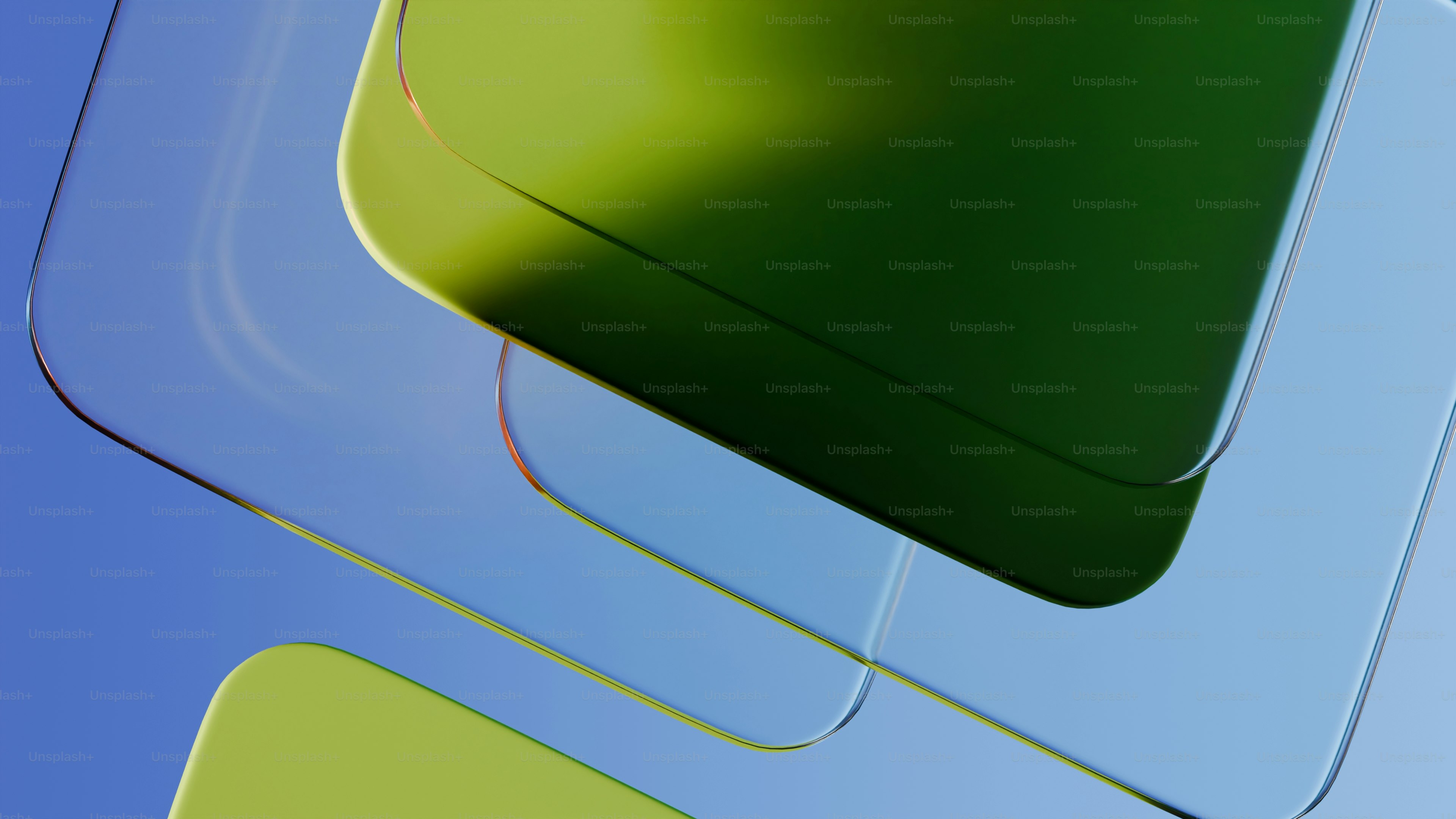 Formes abstraites de verre avec des couleurs vertes et bleues