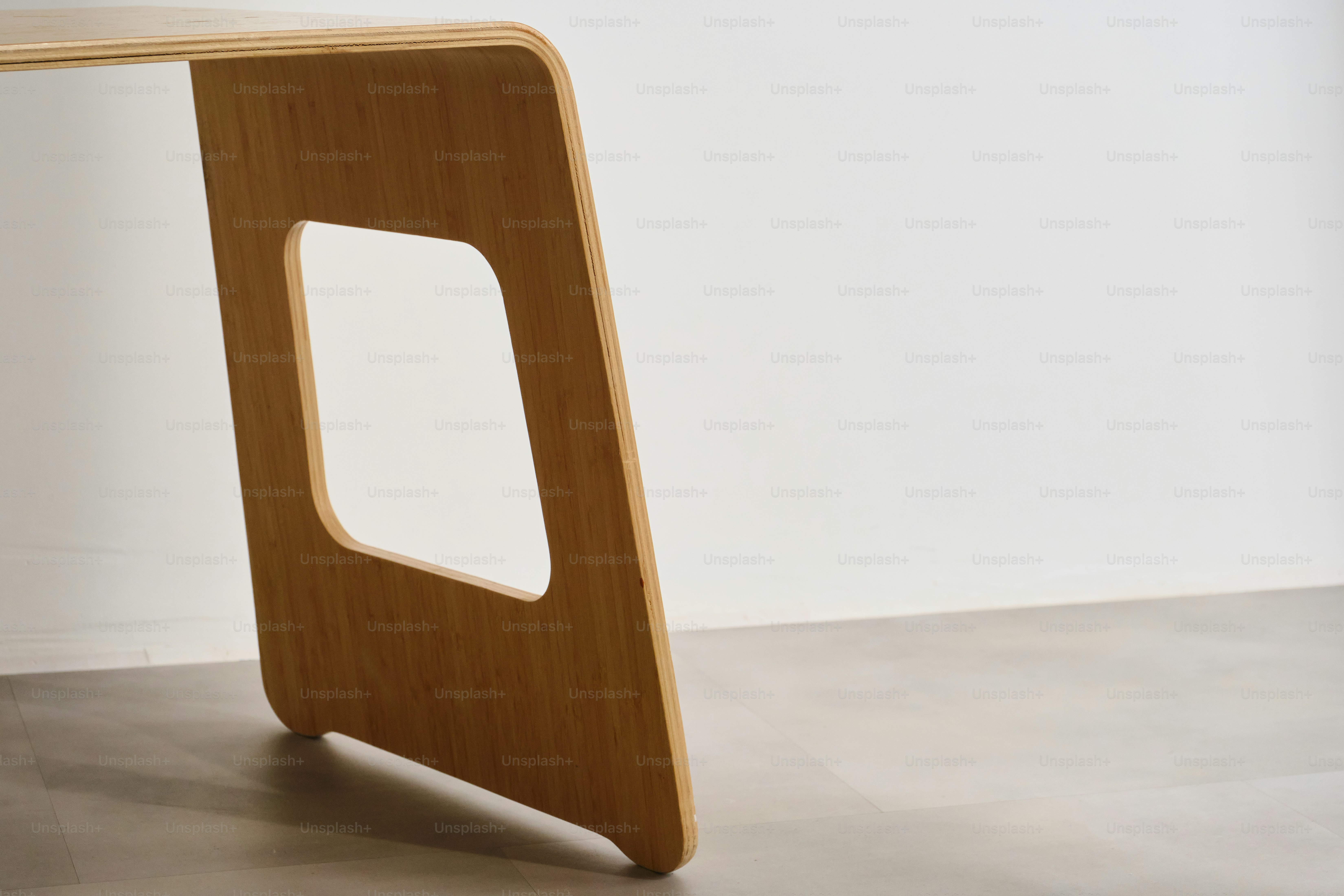 Minimal single furniture pieces photographed on neutral backgrounds