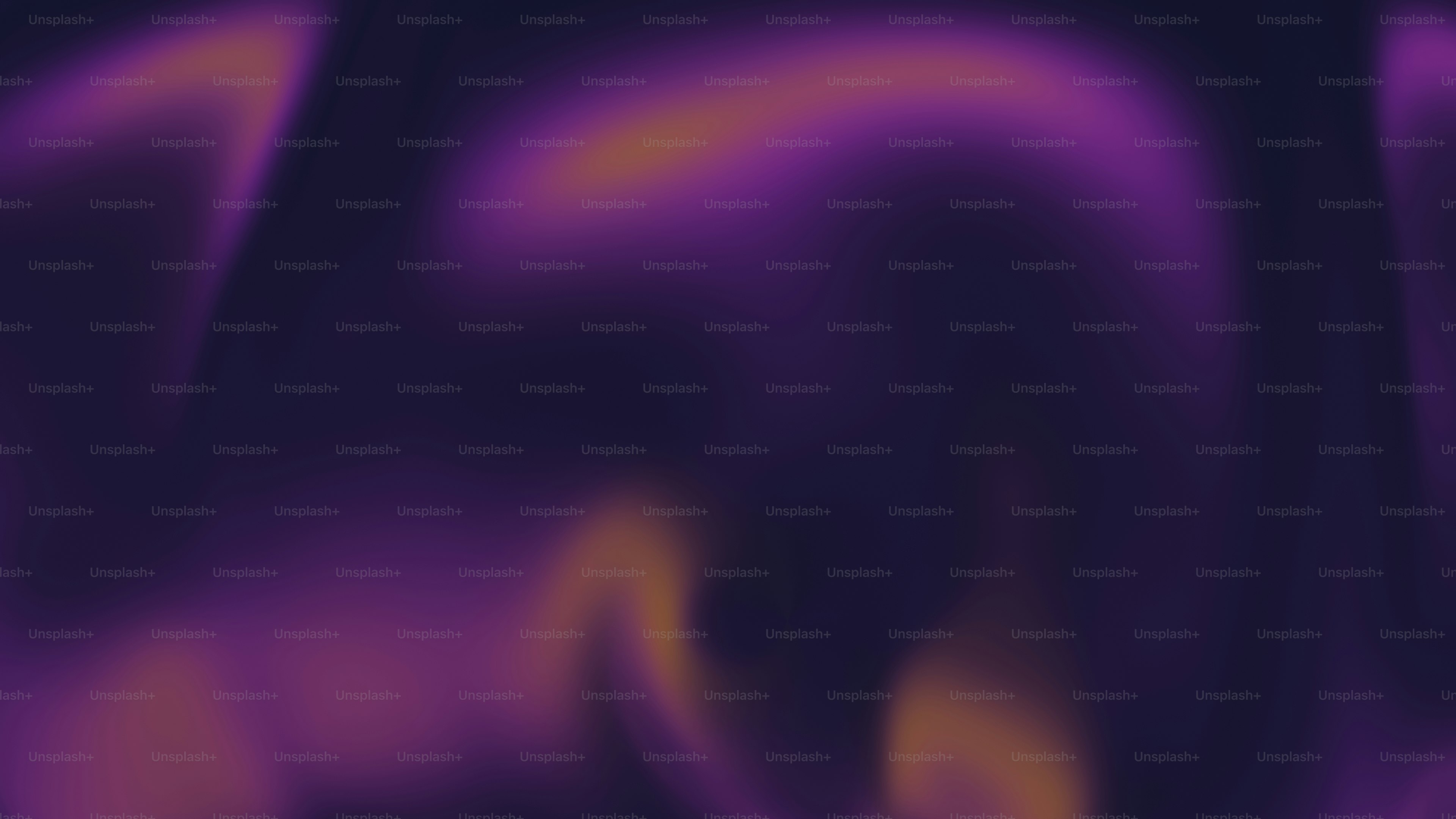 어두운 배경에 추상적인 보라색과 주황색 소용돌이