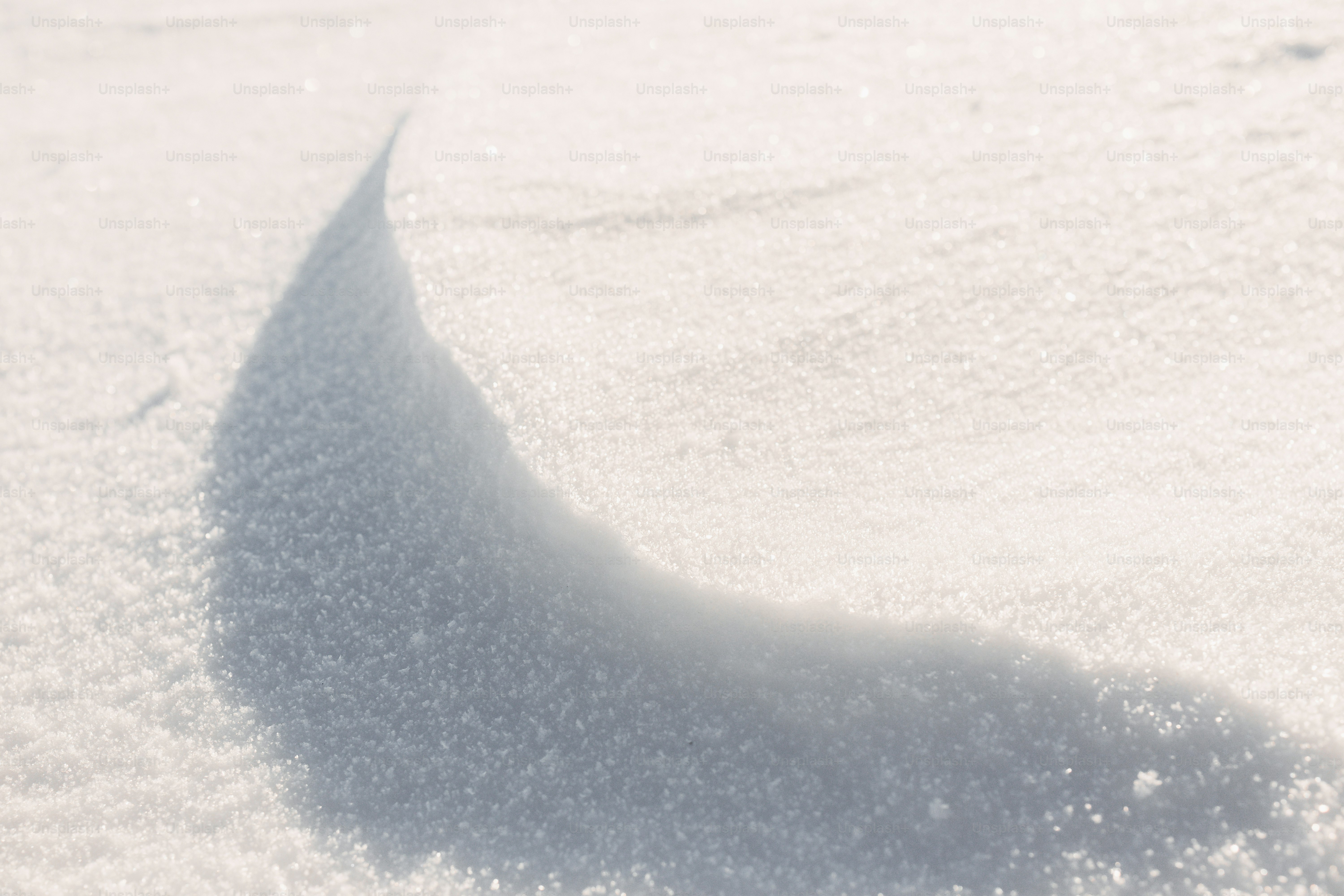 Close-up of a snowdrift with shadows