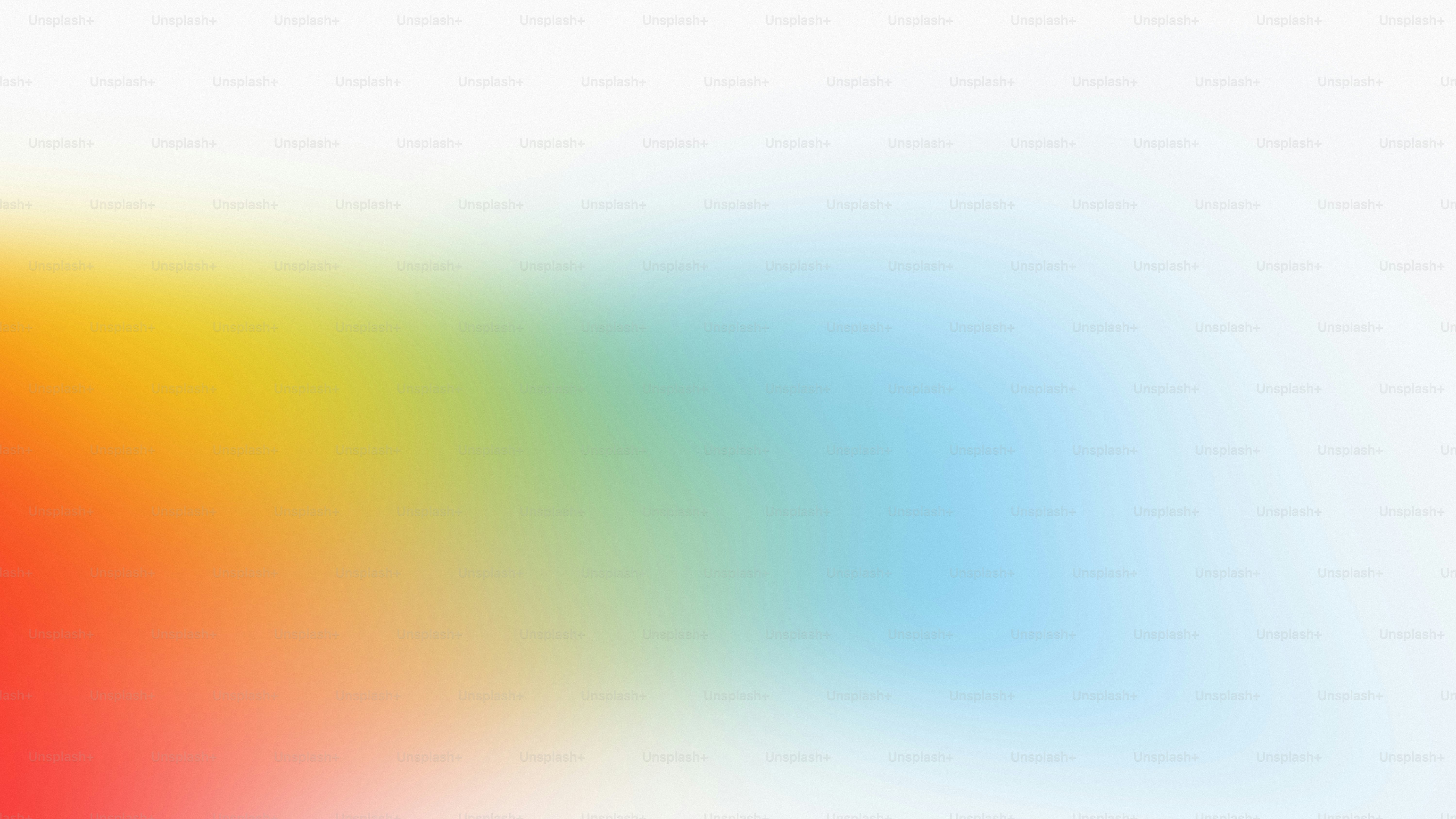 Gradiente astratto di colori rosso, giallo, verde e blu.