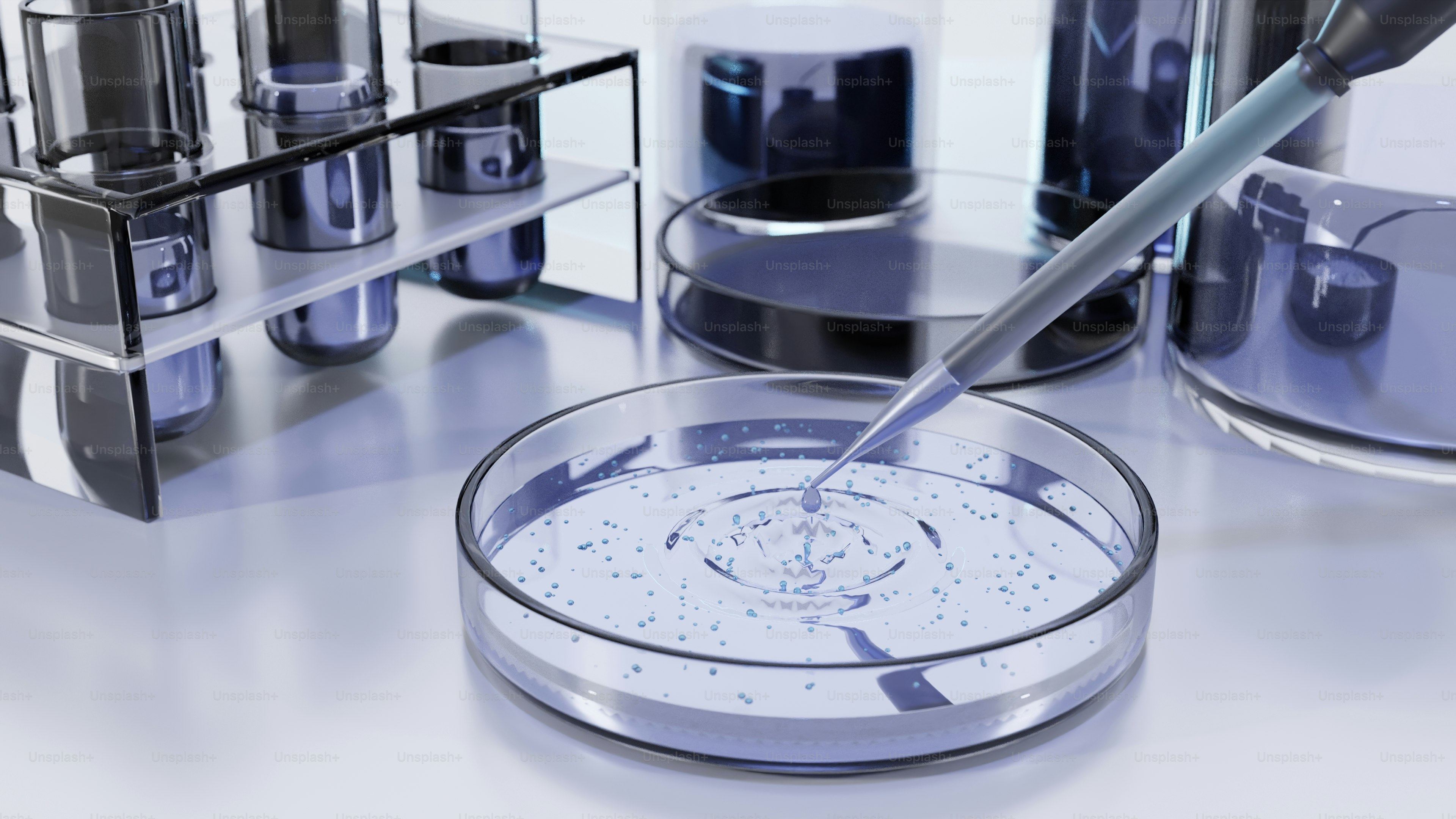 Pipetta che aggiunge liquido alla piastra di Petri con campioni.
