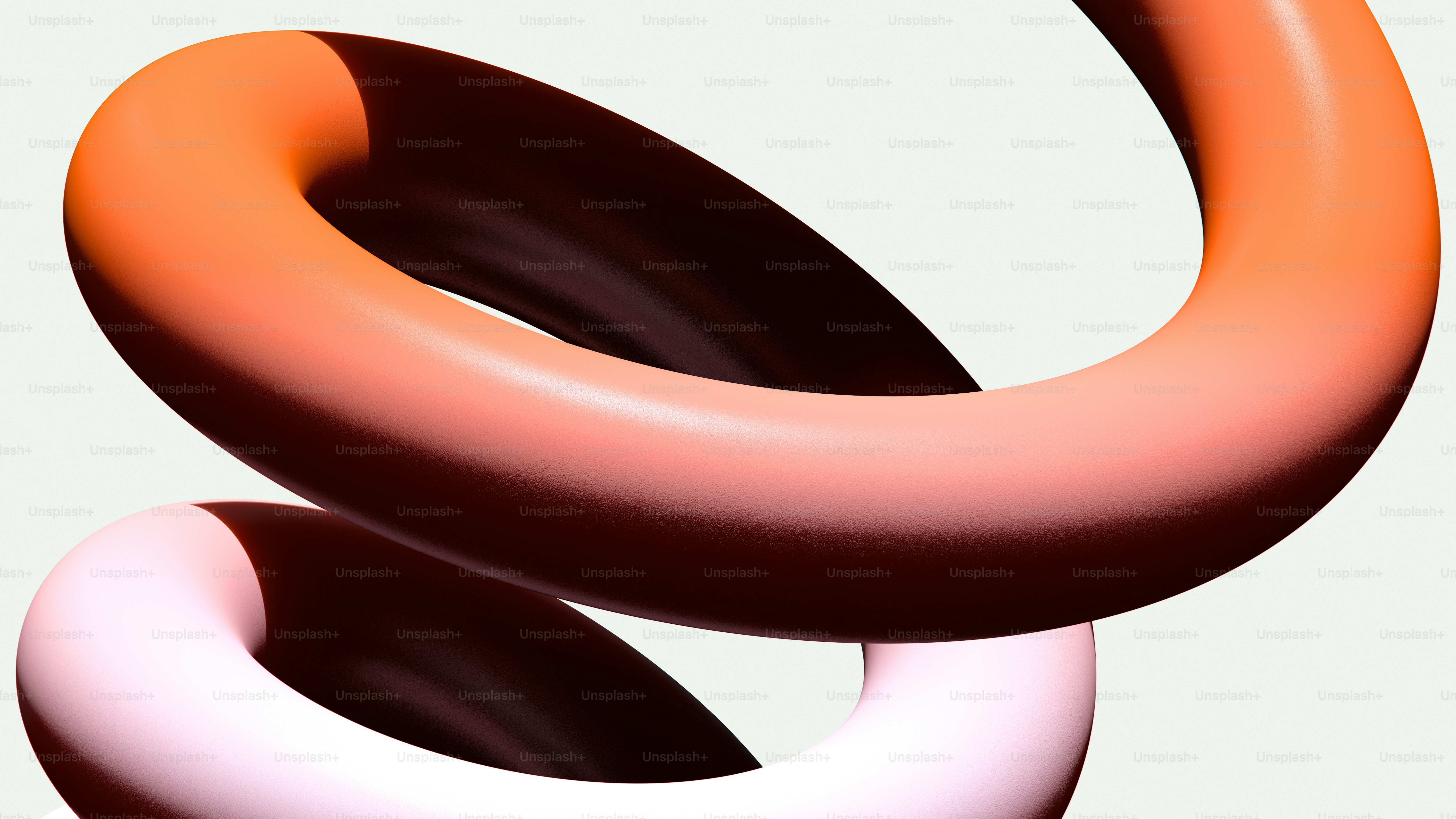 Dos formas de toro entrelazadas con colores degradados.