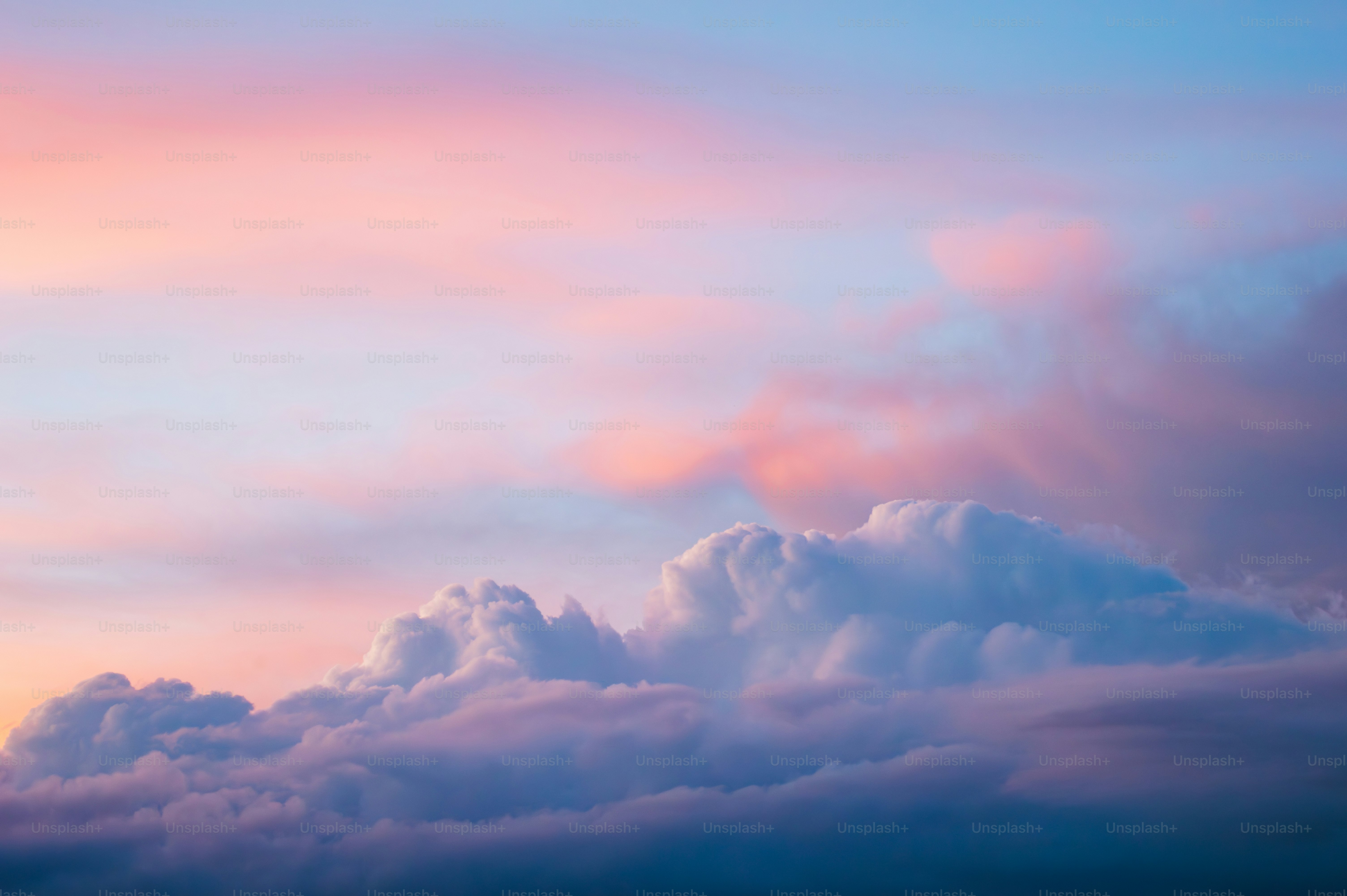 Soft pink and blue clouds at sunset