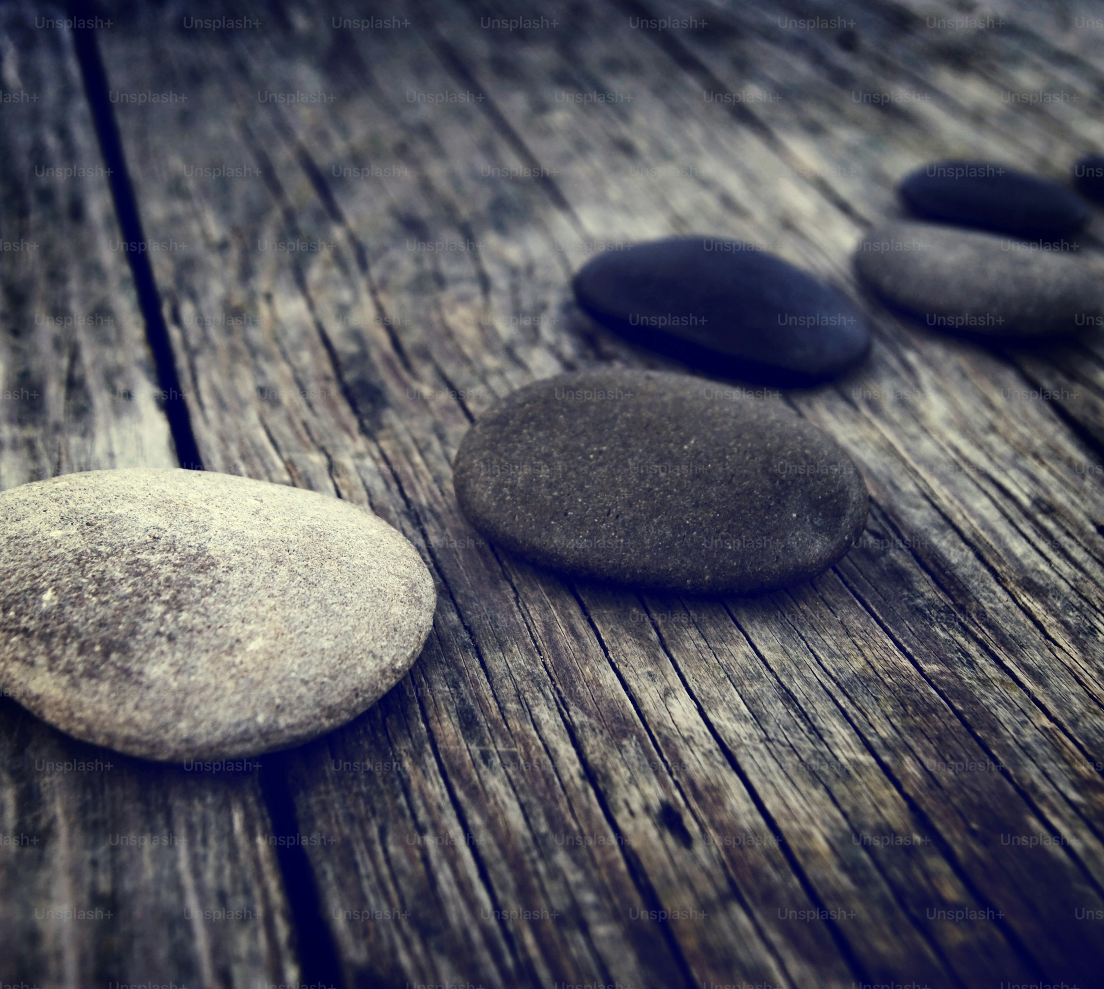 Stones Wooden Table Group of Objects Concept