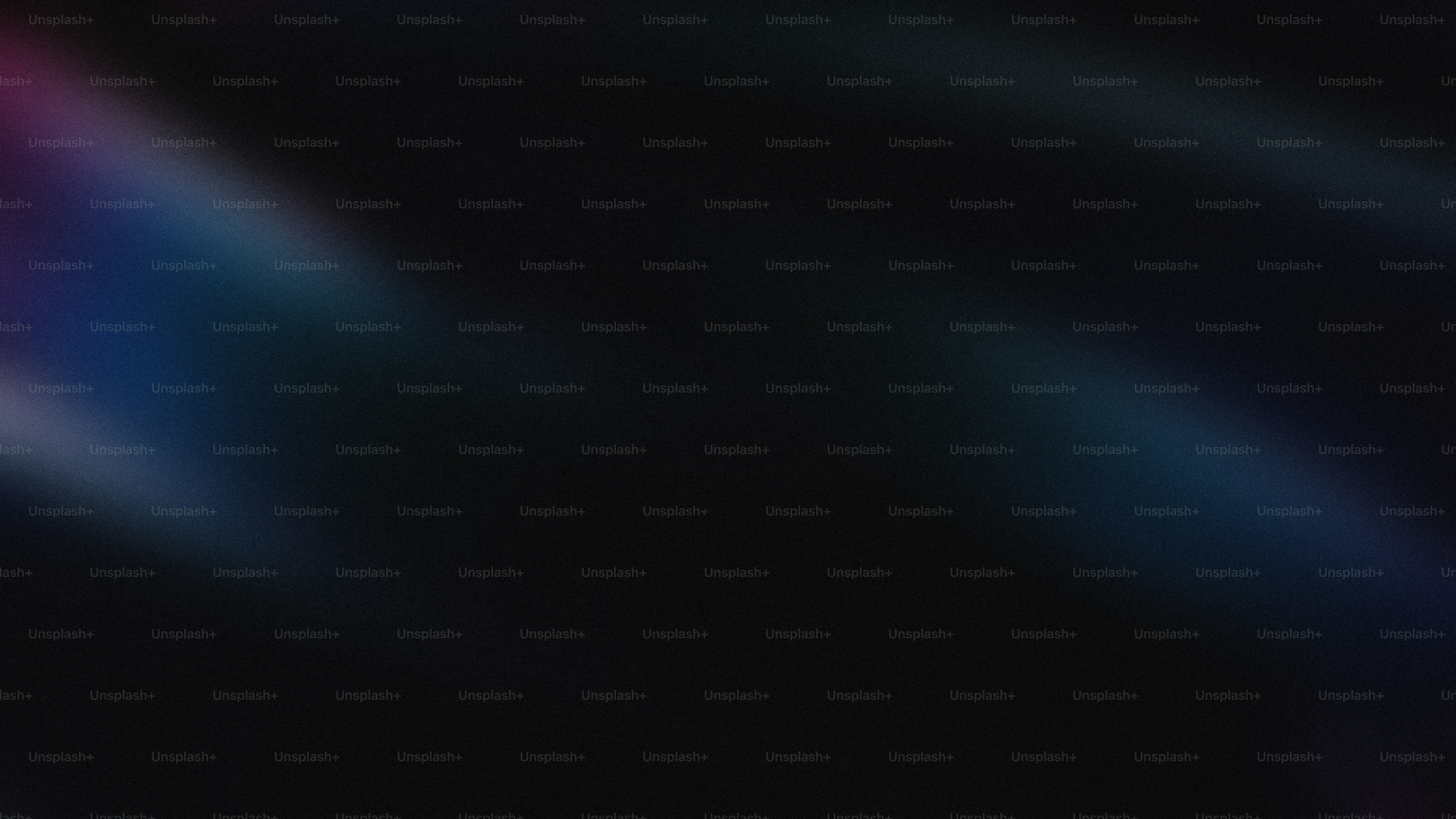 Fond sombre avec des traînées claires colorées abstraites