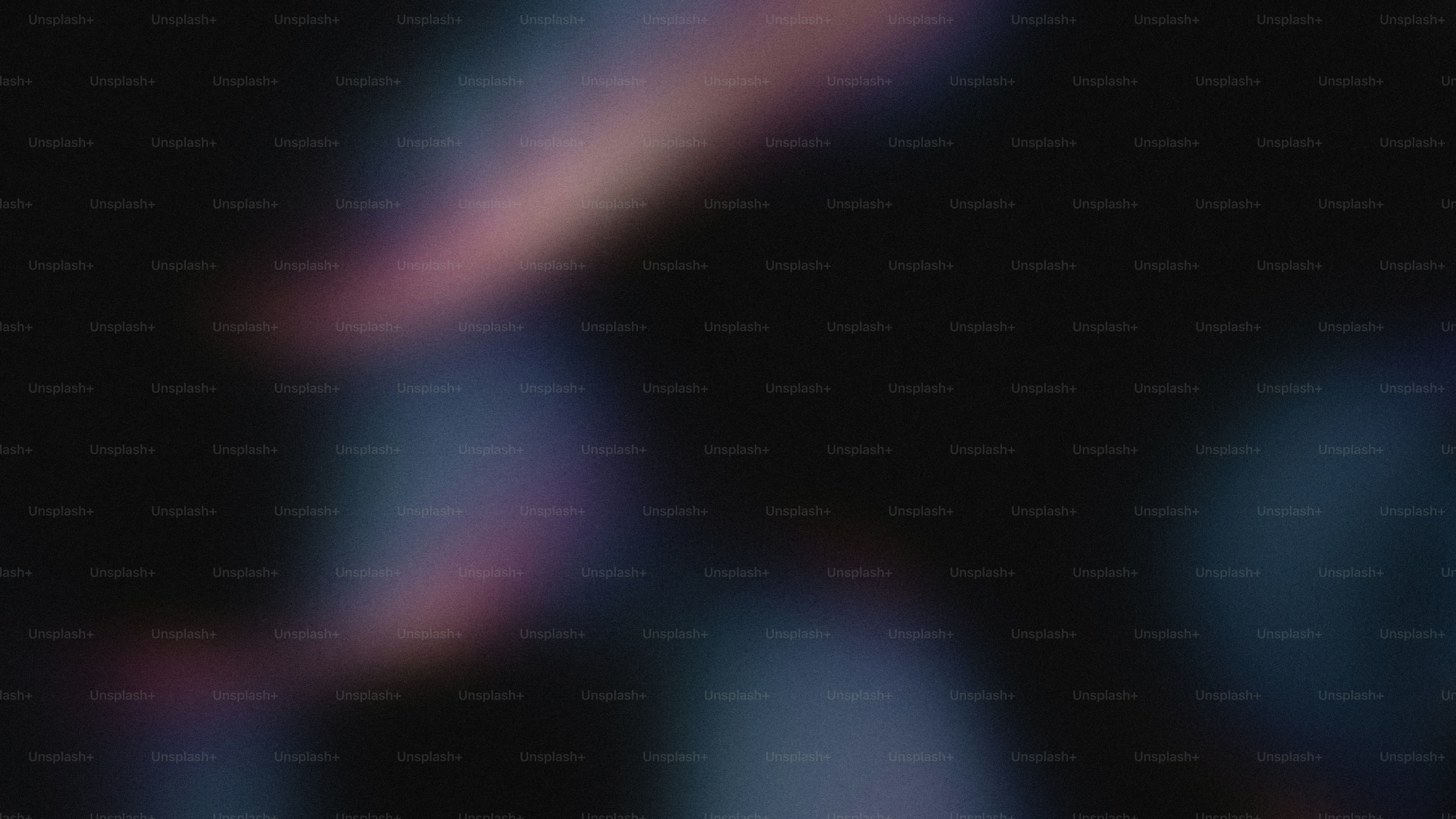 Lumières abstraites floues sur fond sombre