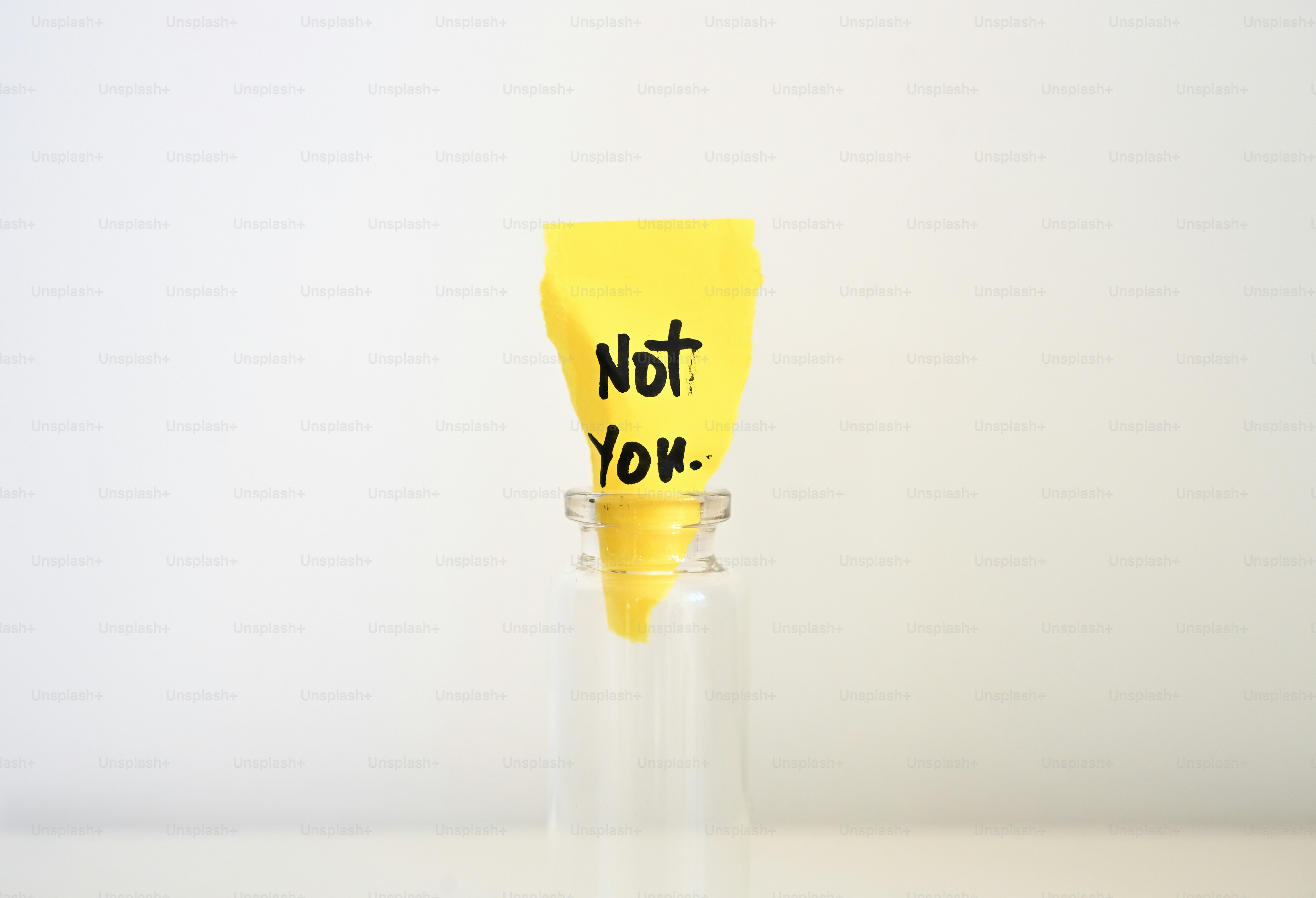 Yellow tube with text 'not you.' on it.