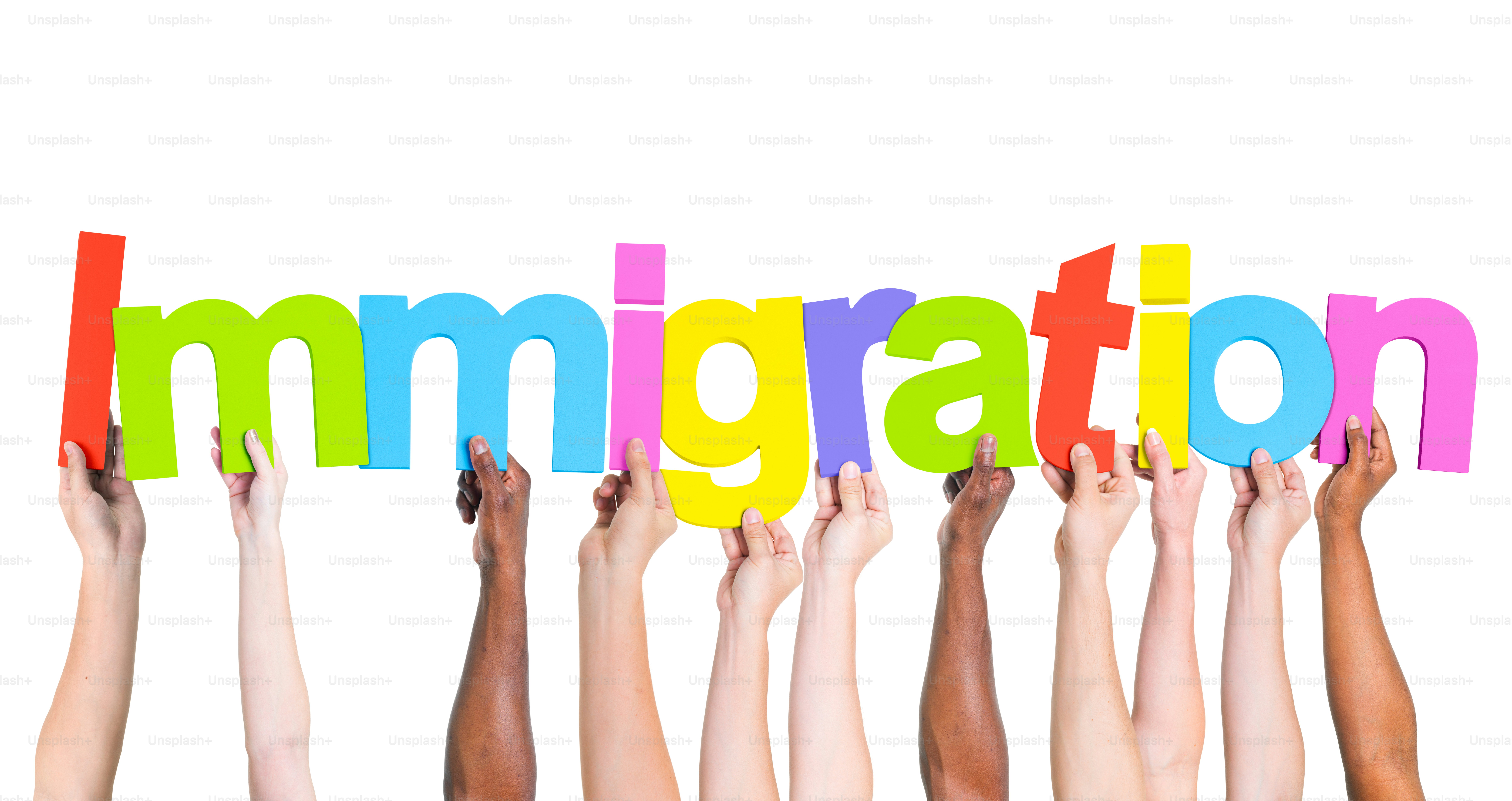 Diverse Hands Holding the Word Immigration