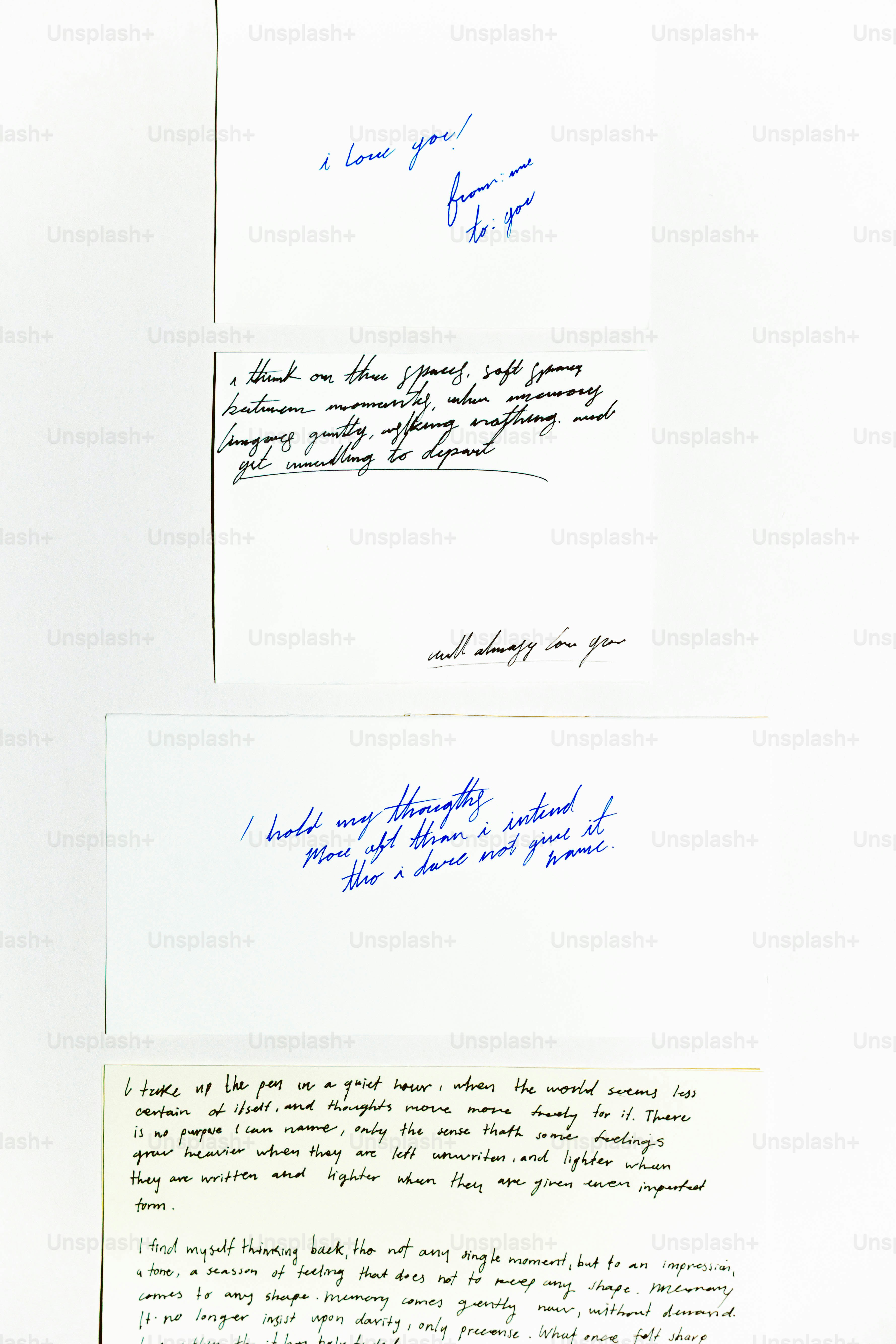 Four handwritten notes with blue ink on white paper.