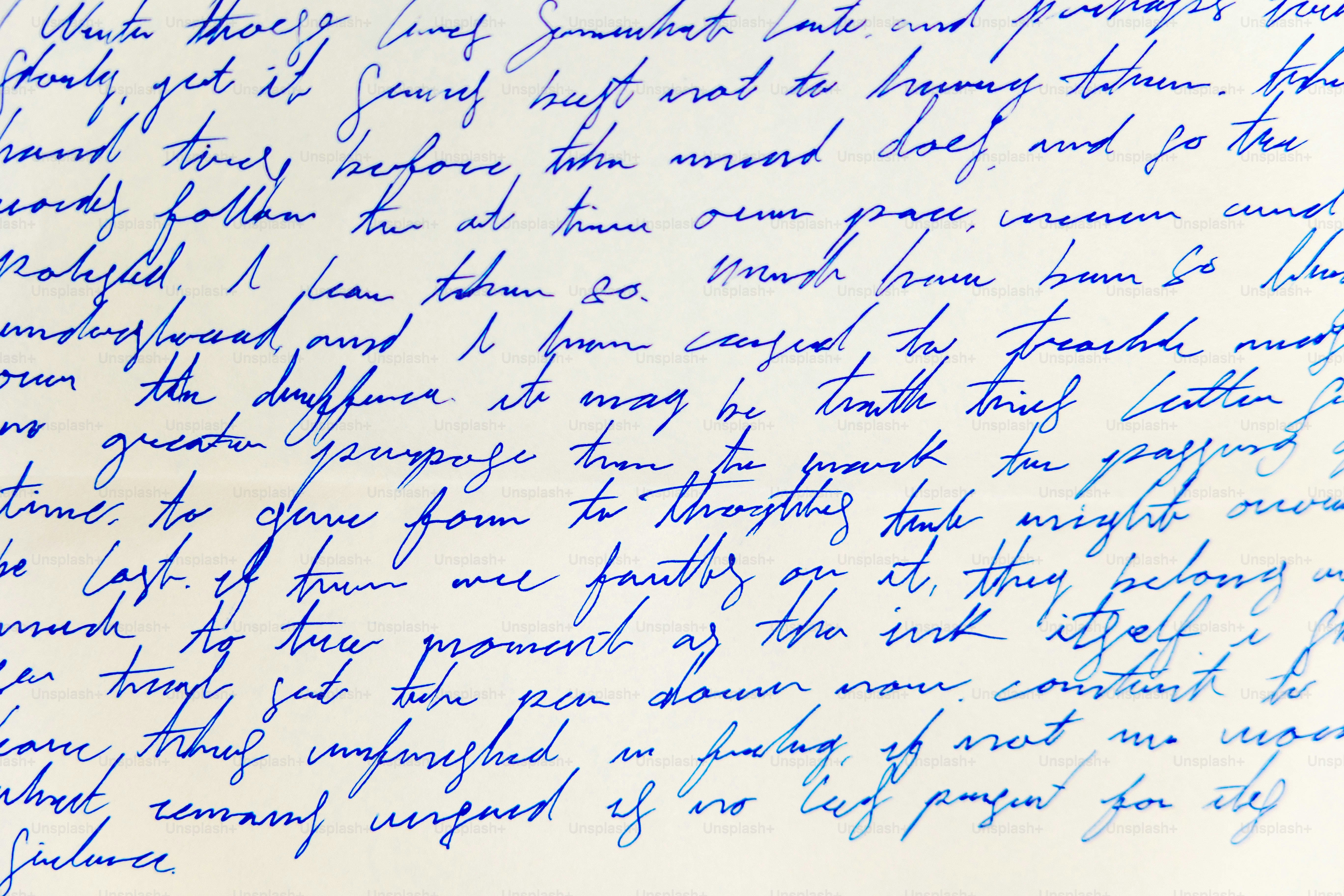 Handwritten blue ink text on lined paper