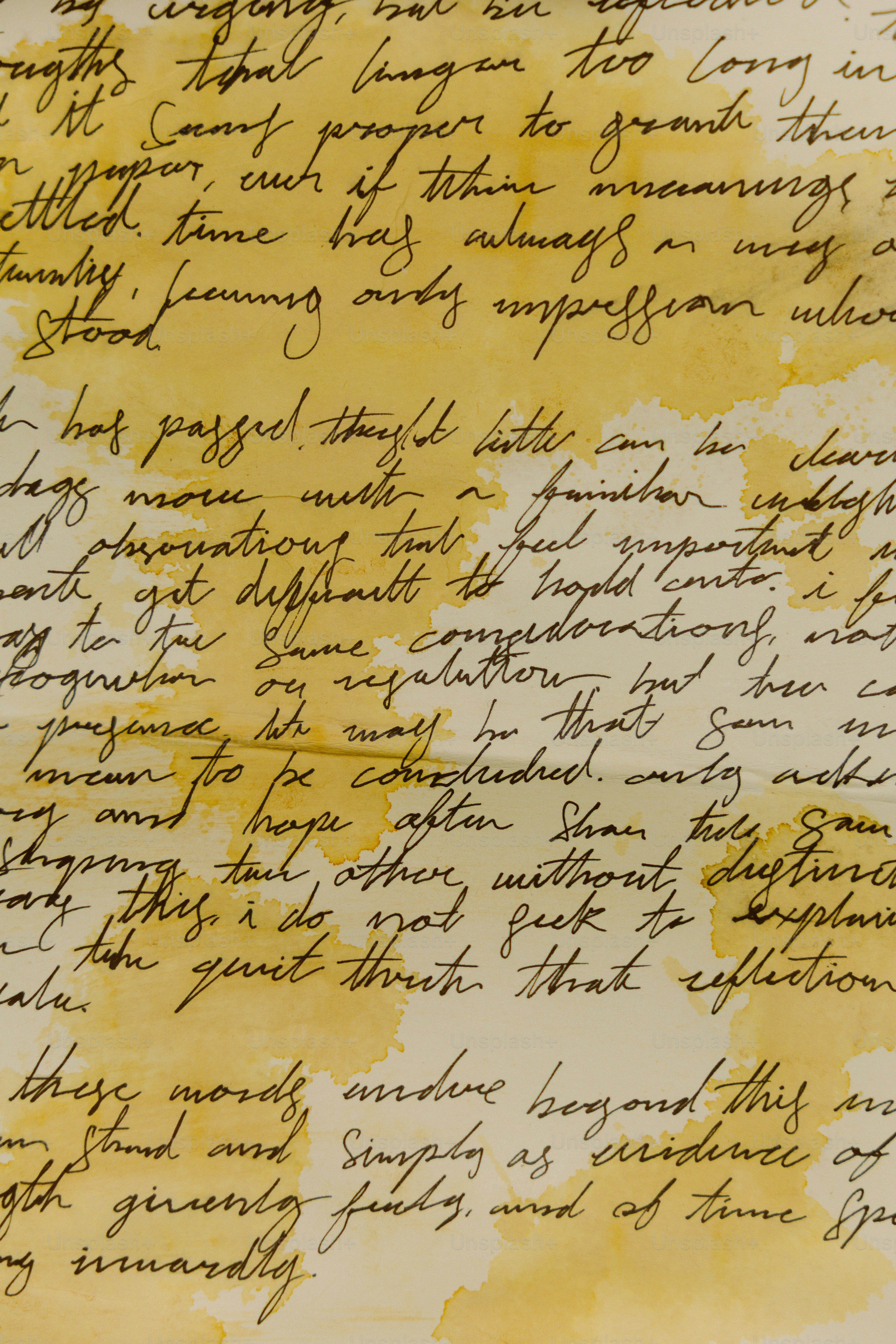Old handwritten letter with stained paper