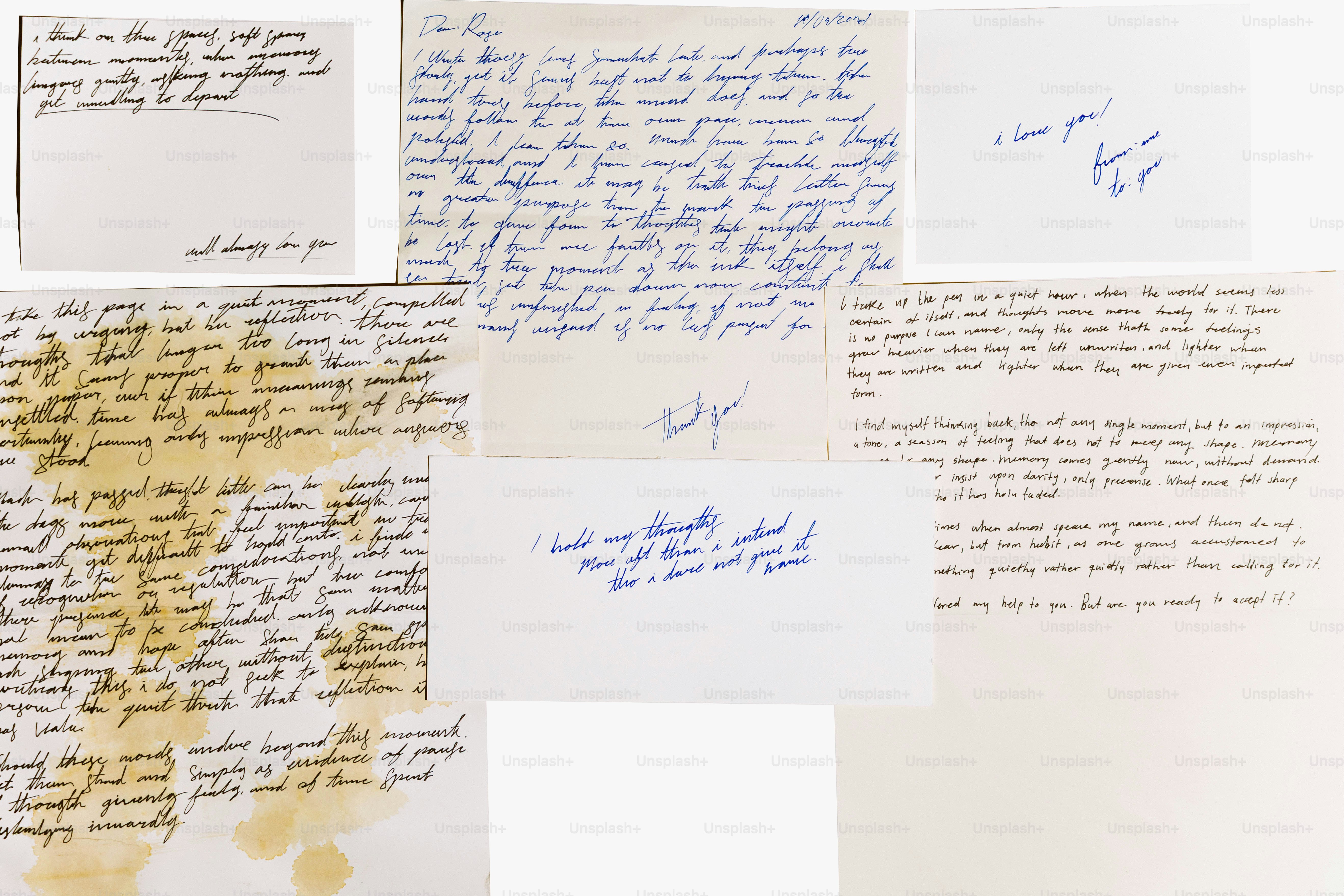 Several handwritten notes and letters on white paper.