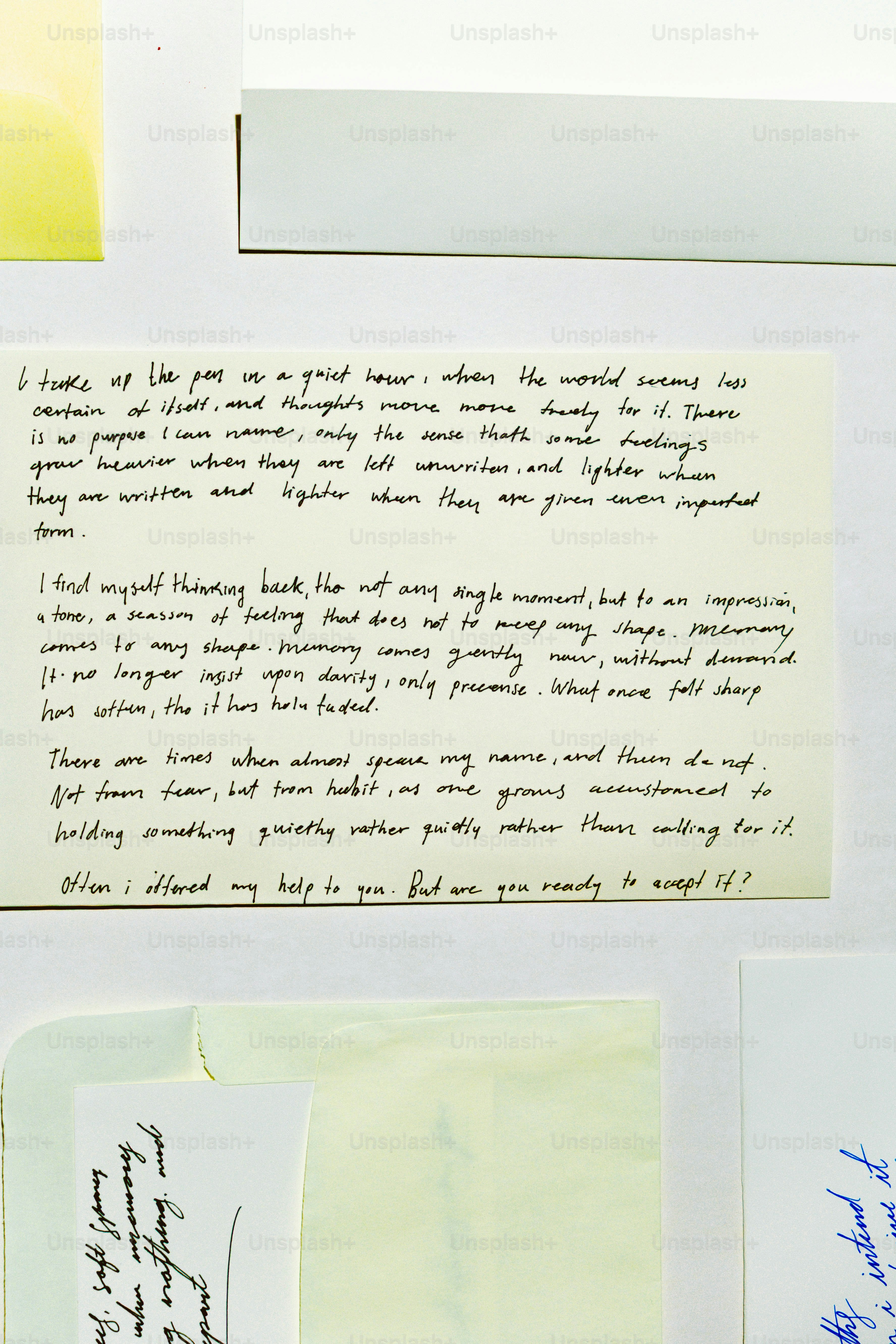 Handwritten notes on a white surface.