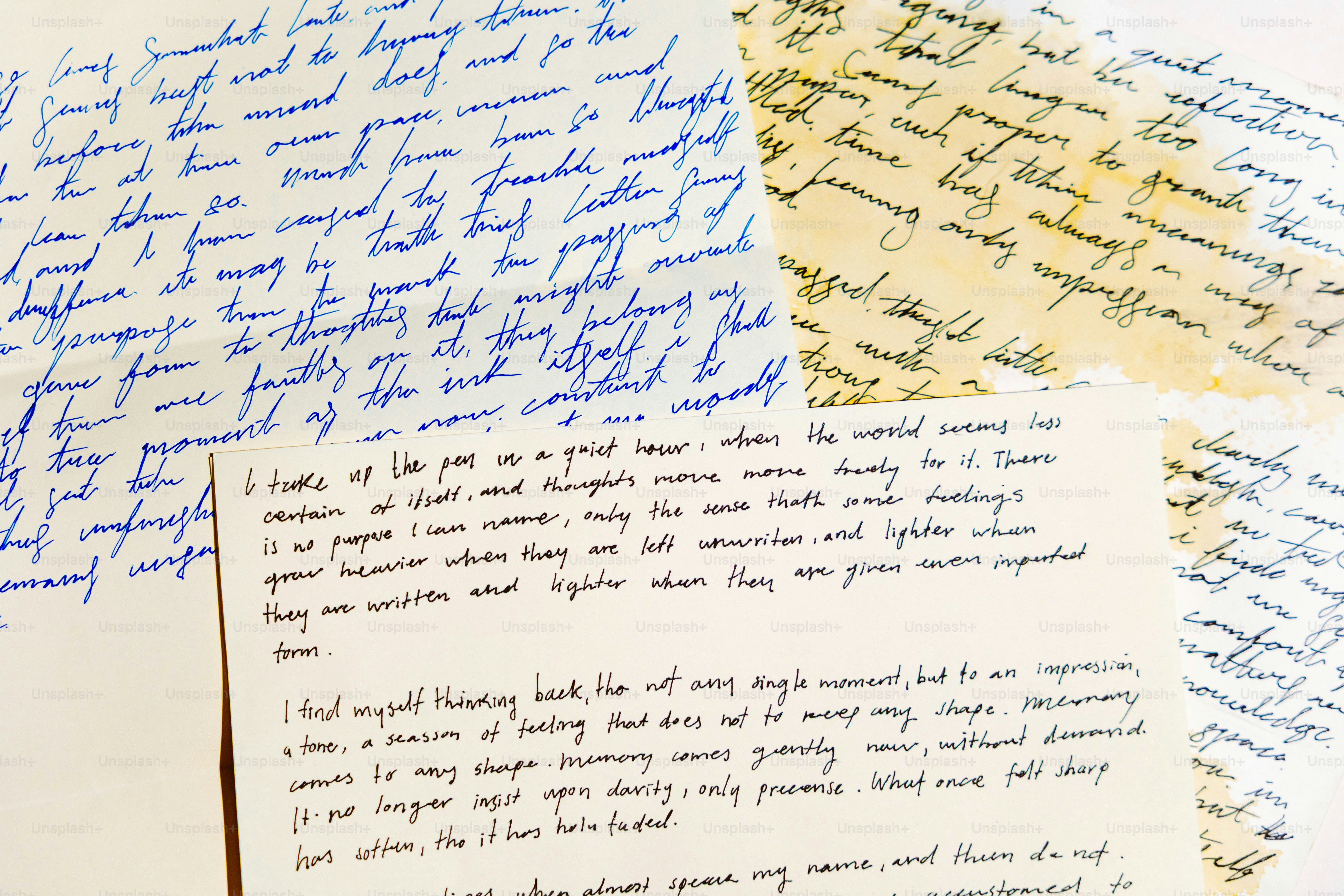 Several handwritten letters scattered on a surface.