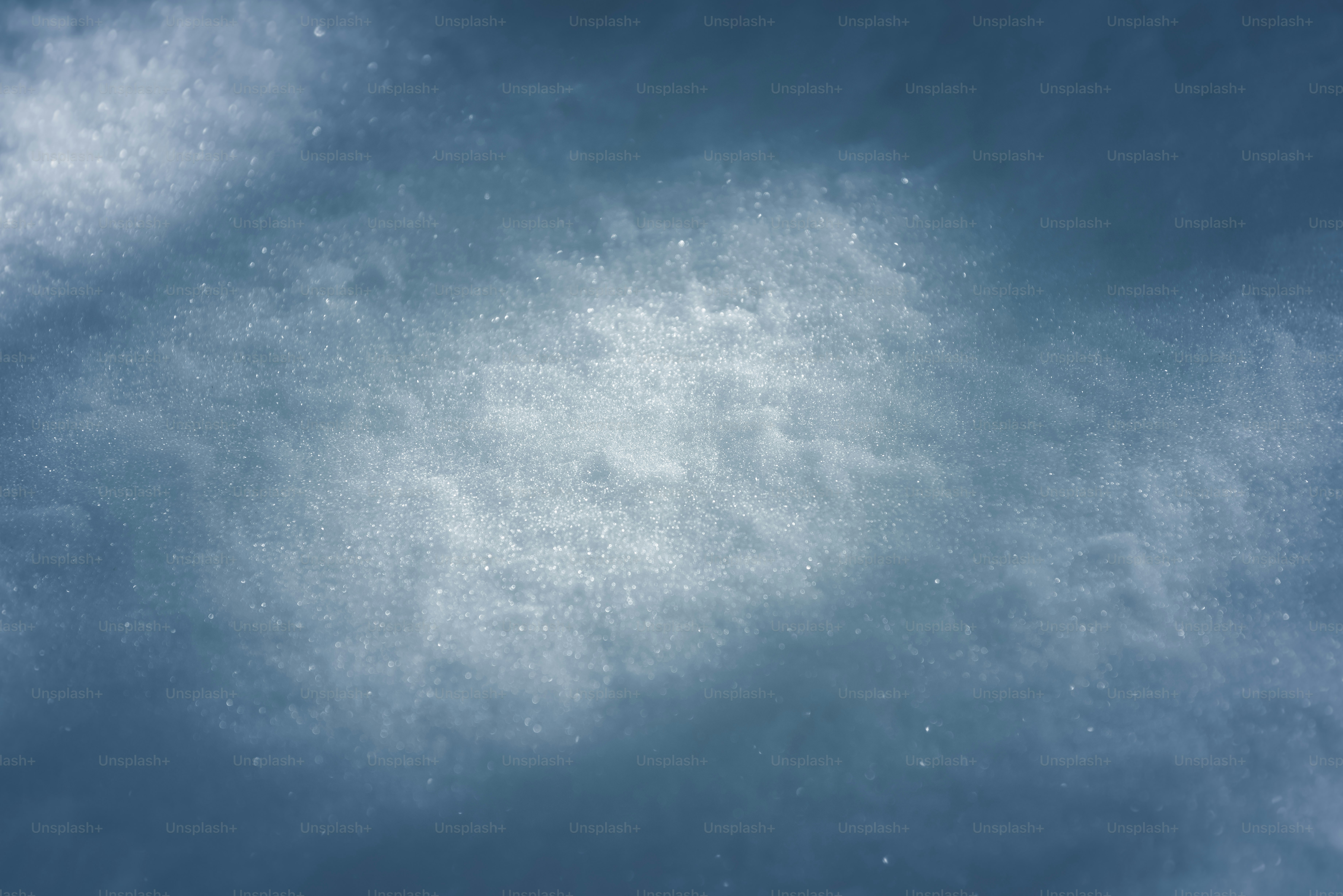 Close-up of textured blue and white snow surface. photo – Abstract ...