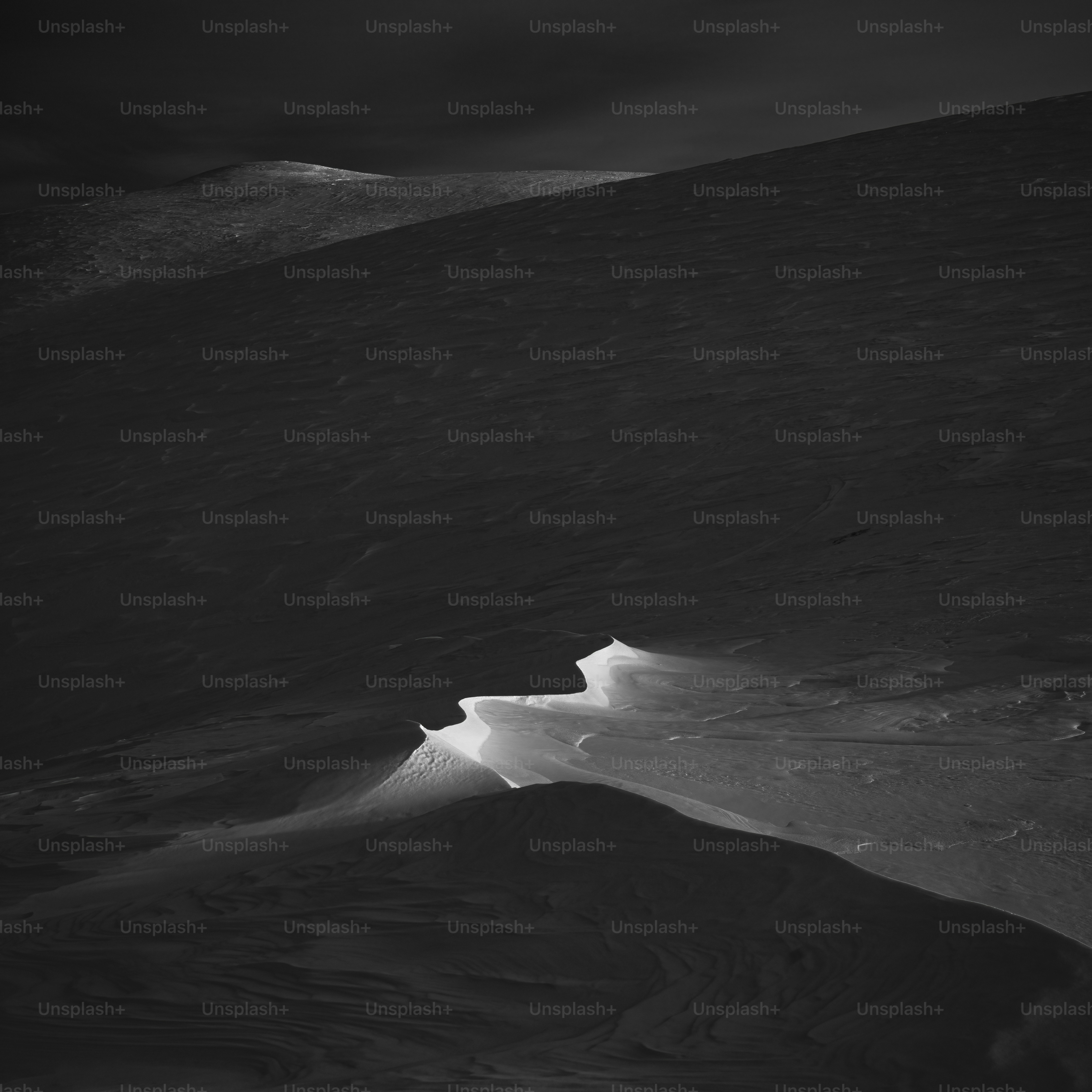 Snowy landscape with dramatic shadows and light photo – Abstract Image ...