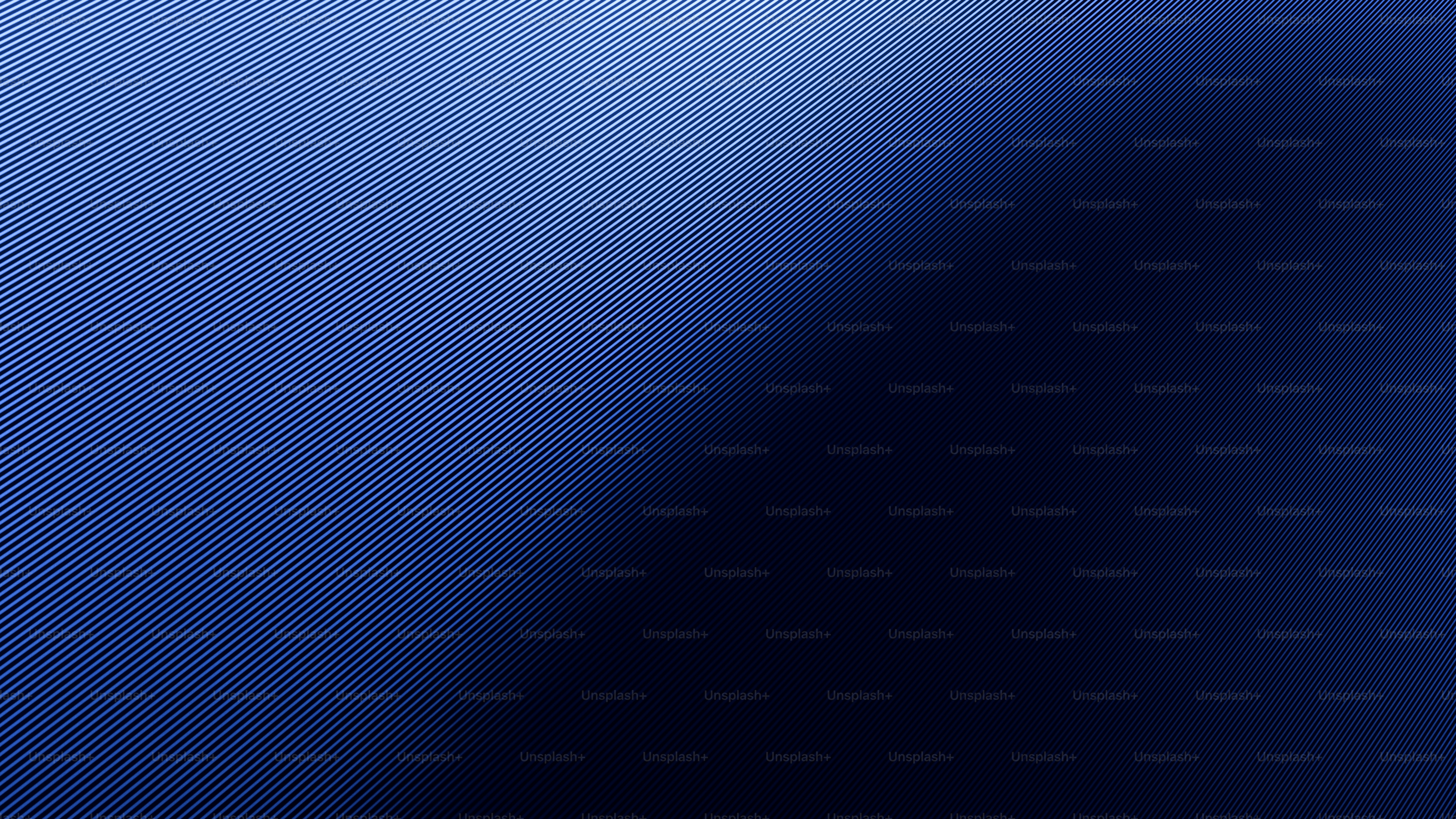 A dark blue gradient background with a diagonal shadow