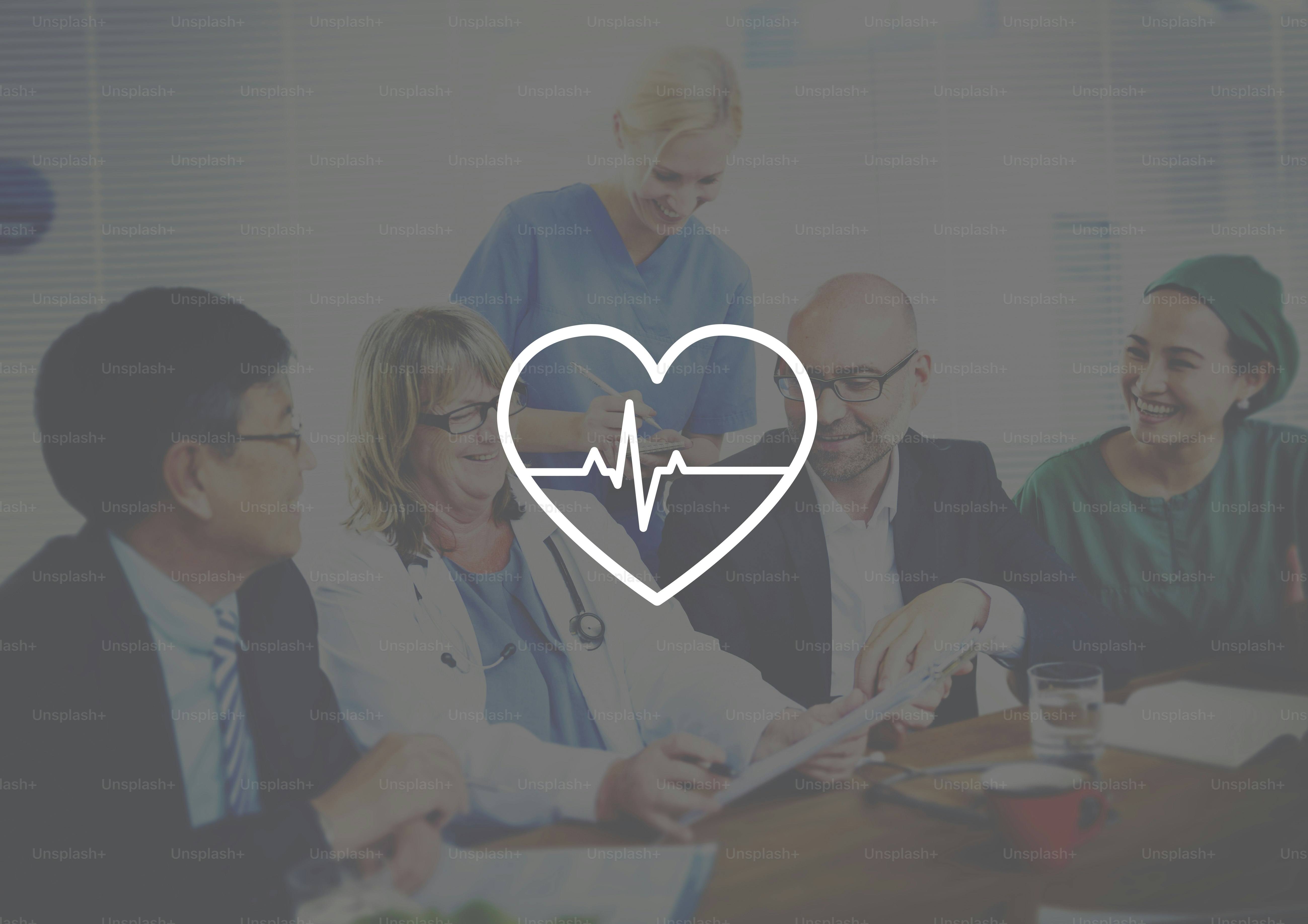 Healthcare and finance professionals discussing figures during a meeting