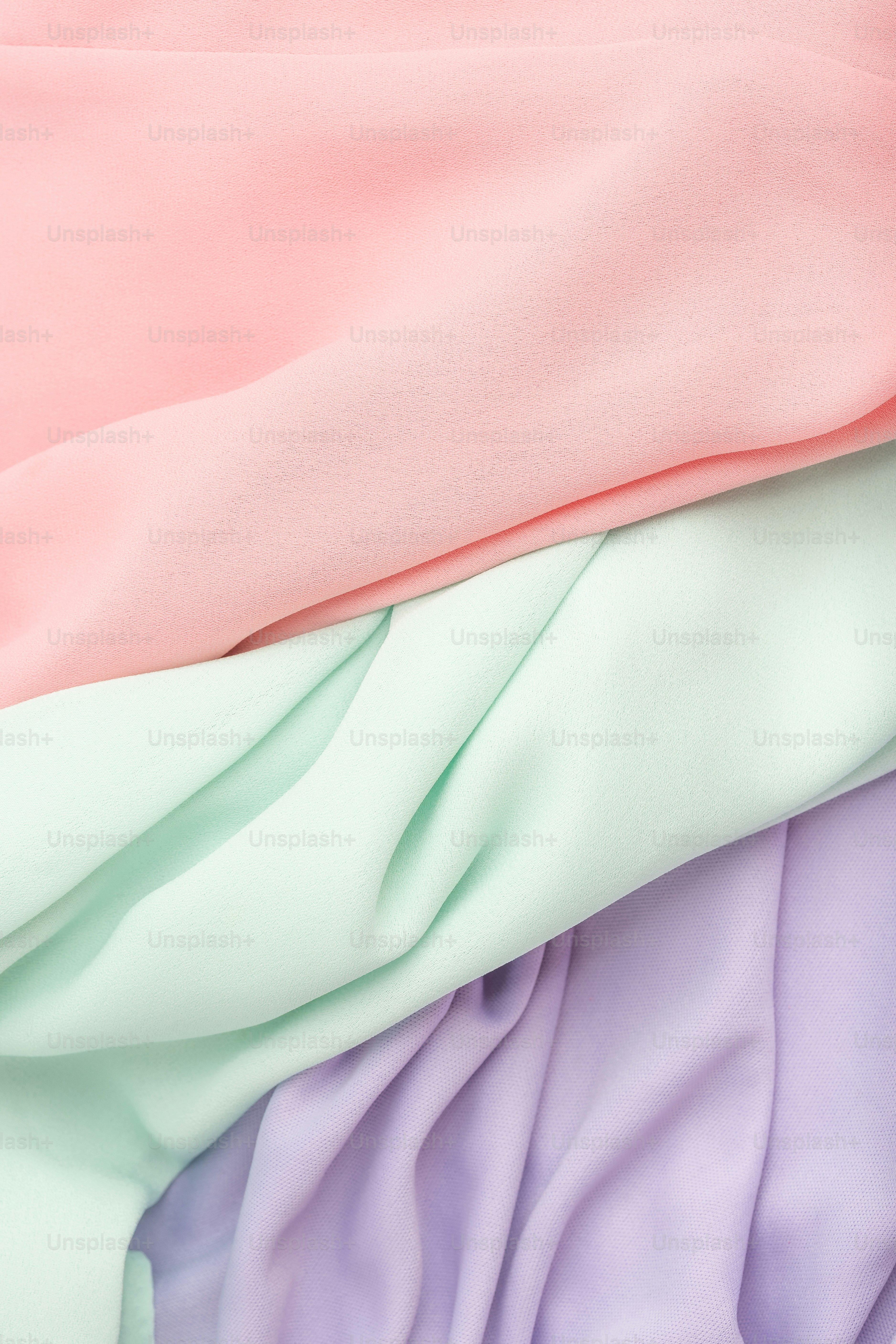 Pastel pink, mint green, and lavender fabric folds