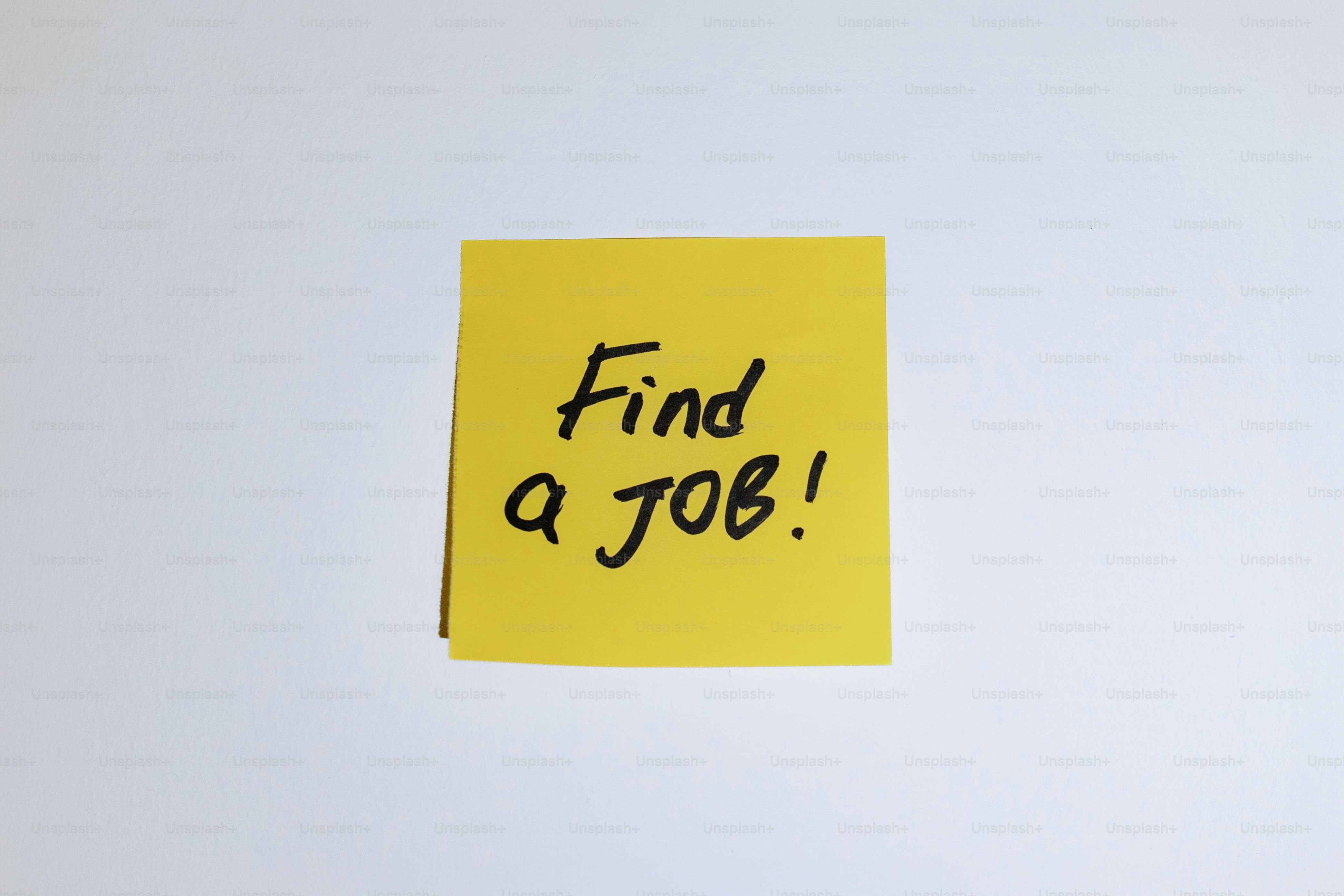 Yellow sticky note with 'find a job!' written.