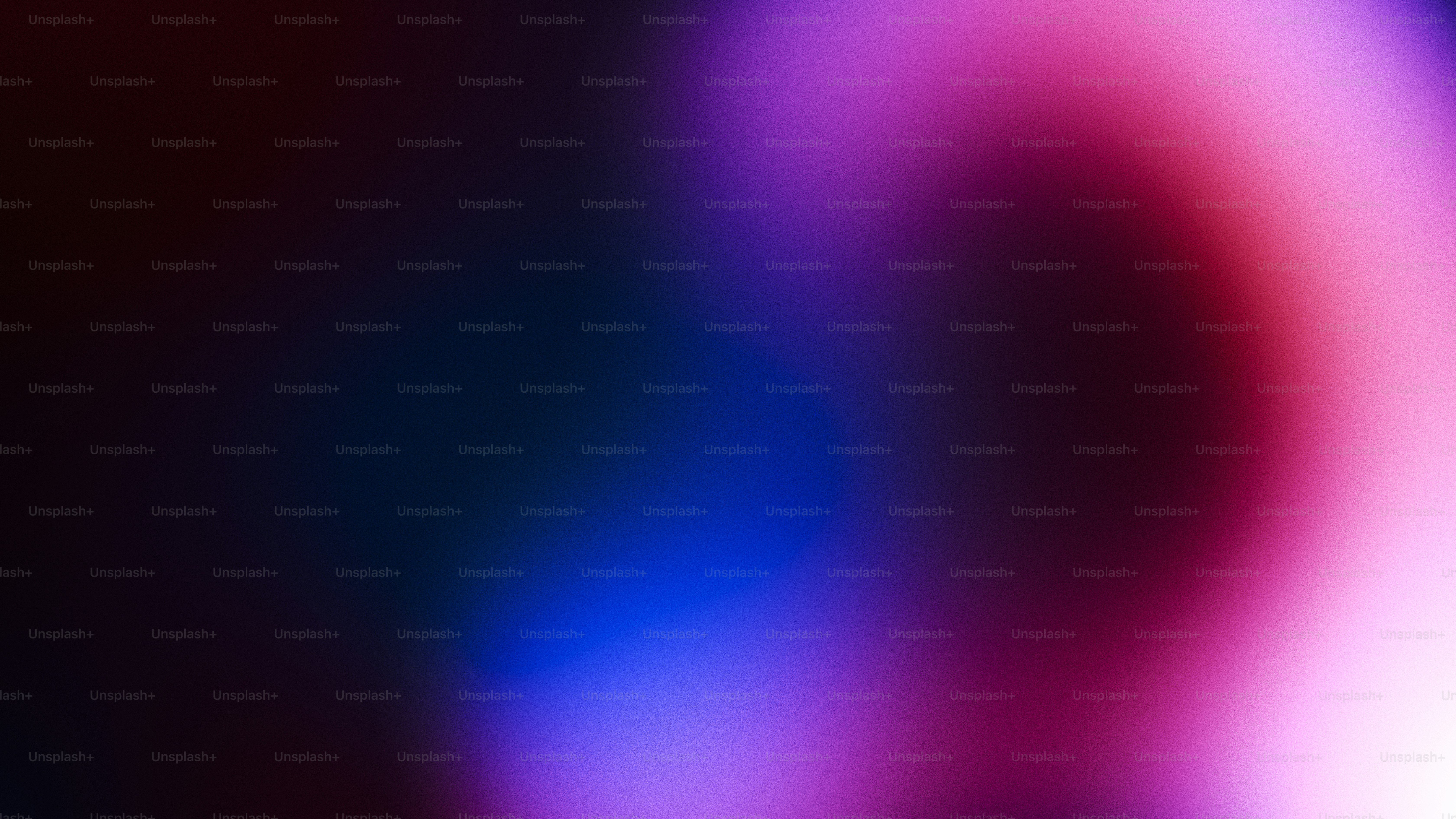 Abstract colorful light streaks on dark background