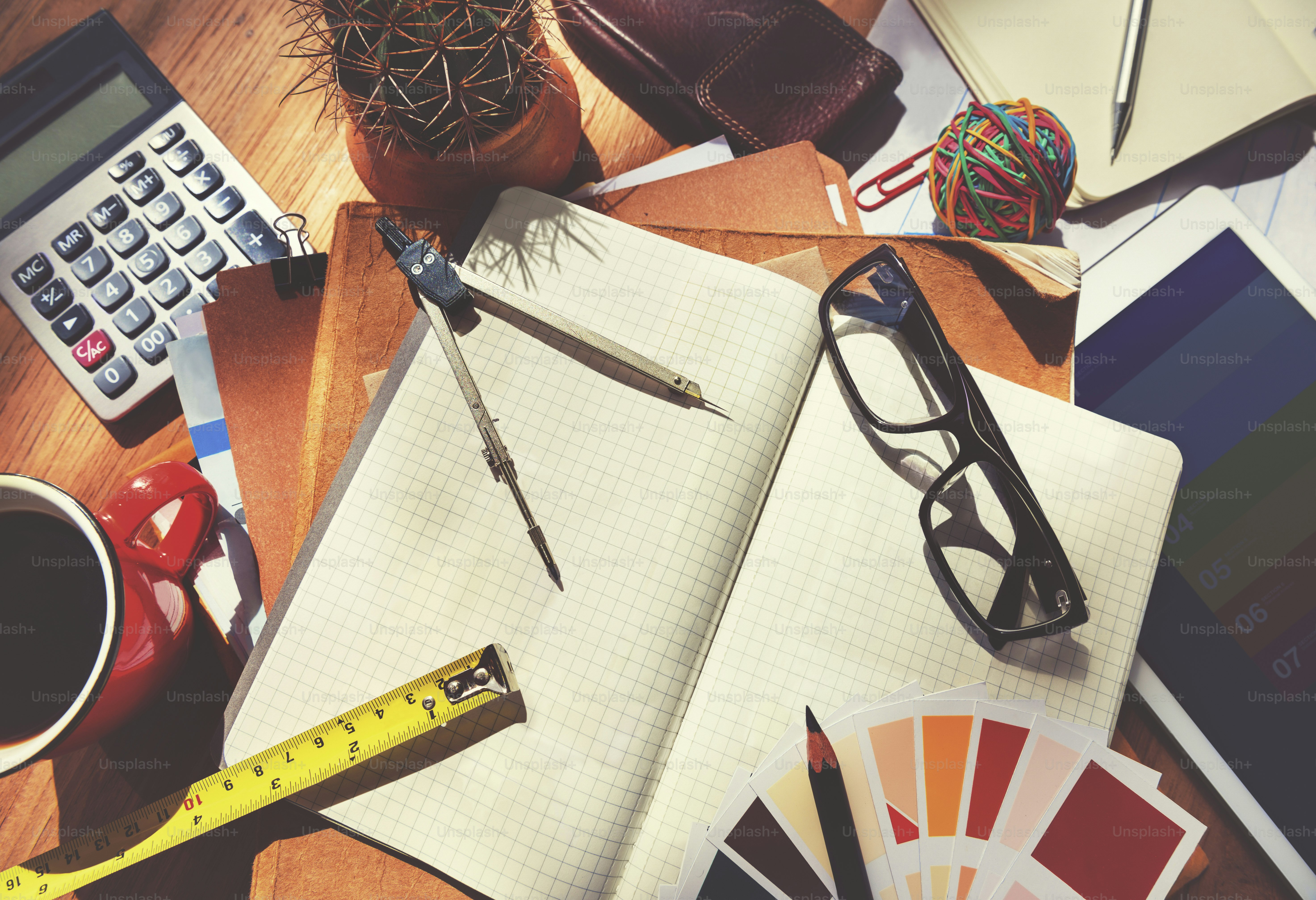 Messy Designer's Table with Tools Concept