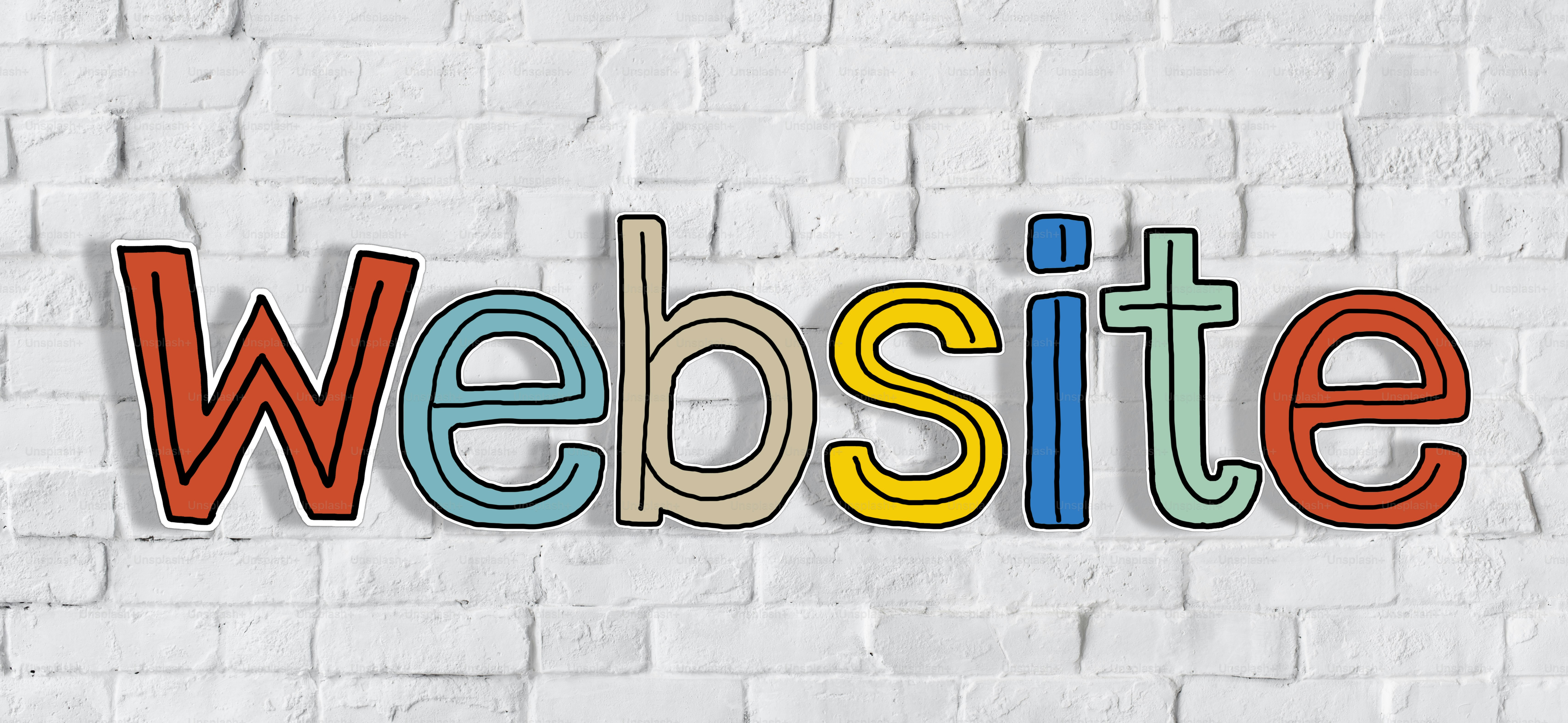 La parola Webiste su un muro di mattoni