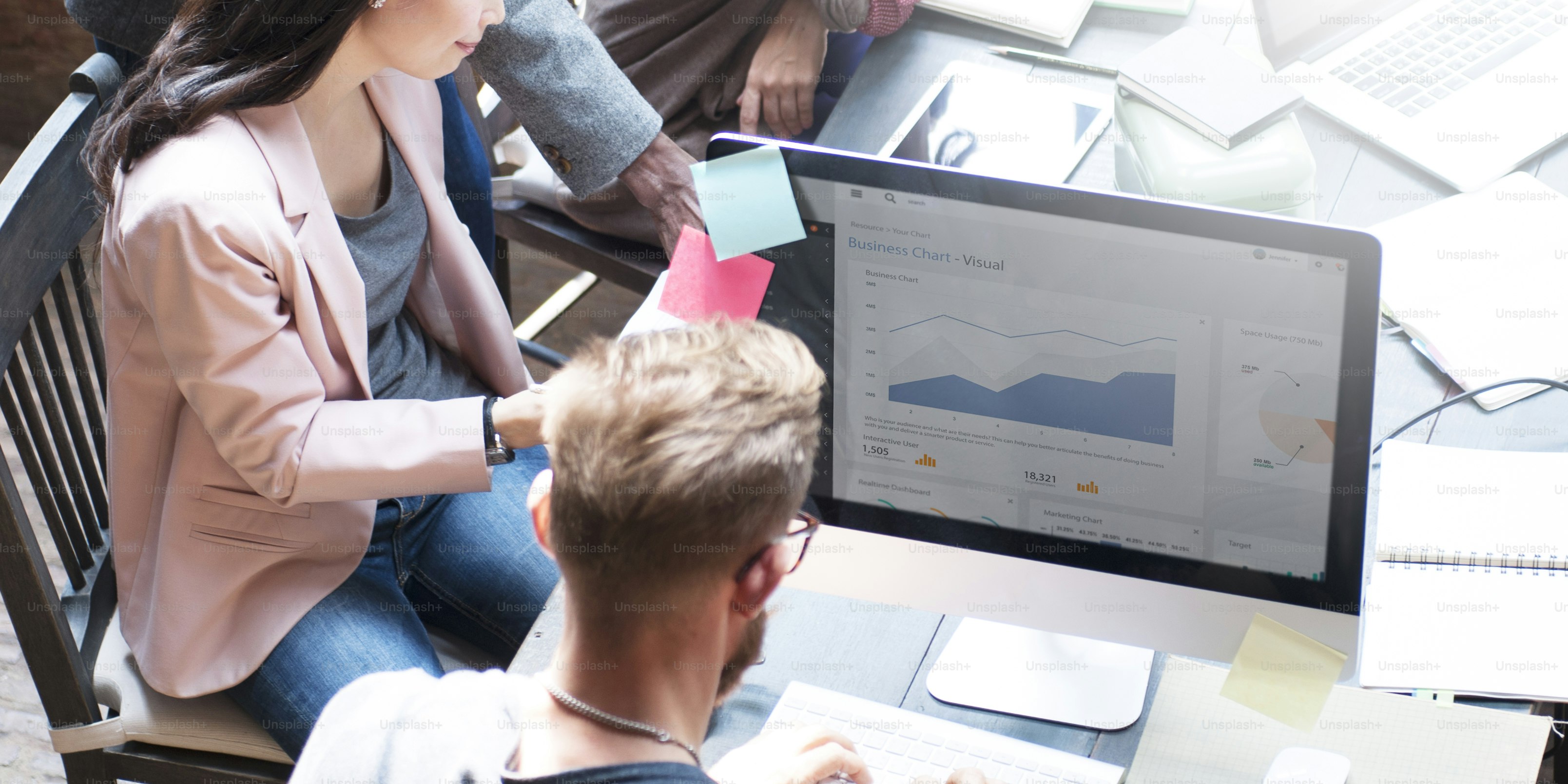 Business team discussing digital marketing data and online visibility strategy