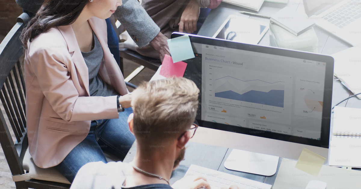 Business team discussing digital marketing data and online visibility strategy
