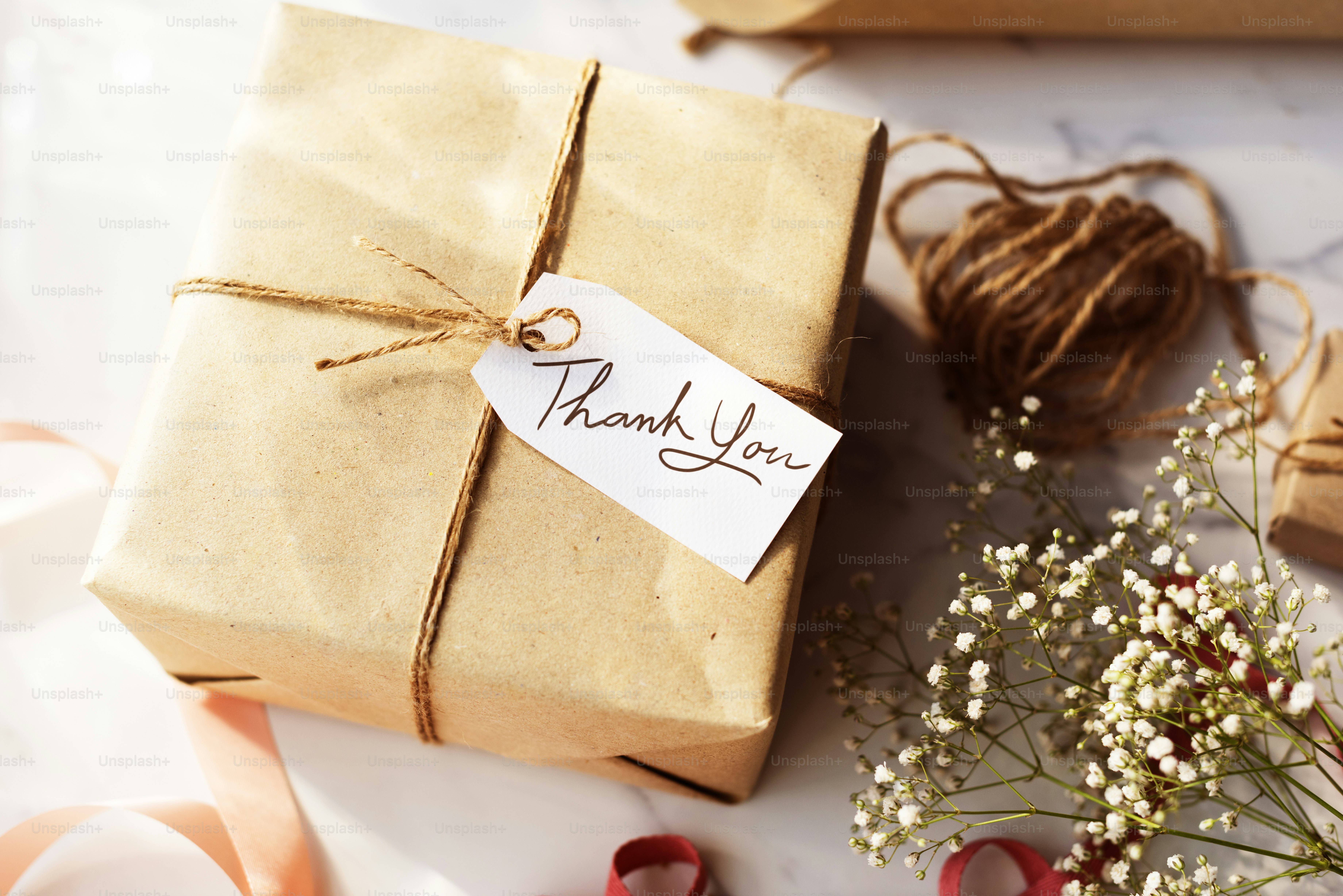 Craft Design wrapped gift parcel Concept photo – Presentation Image on ...