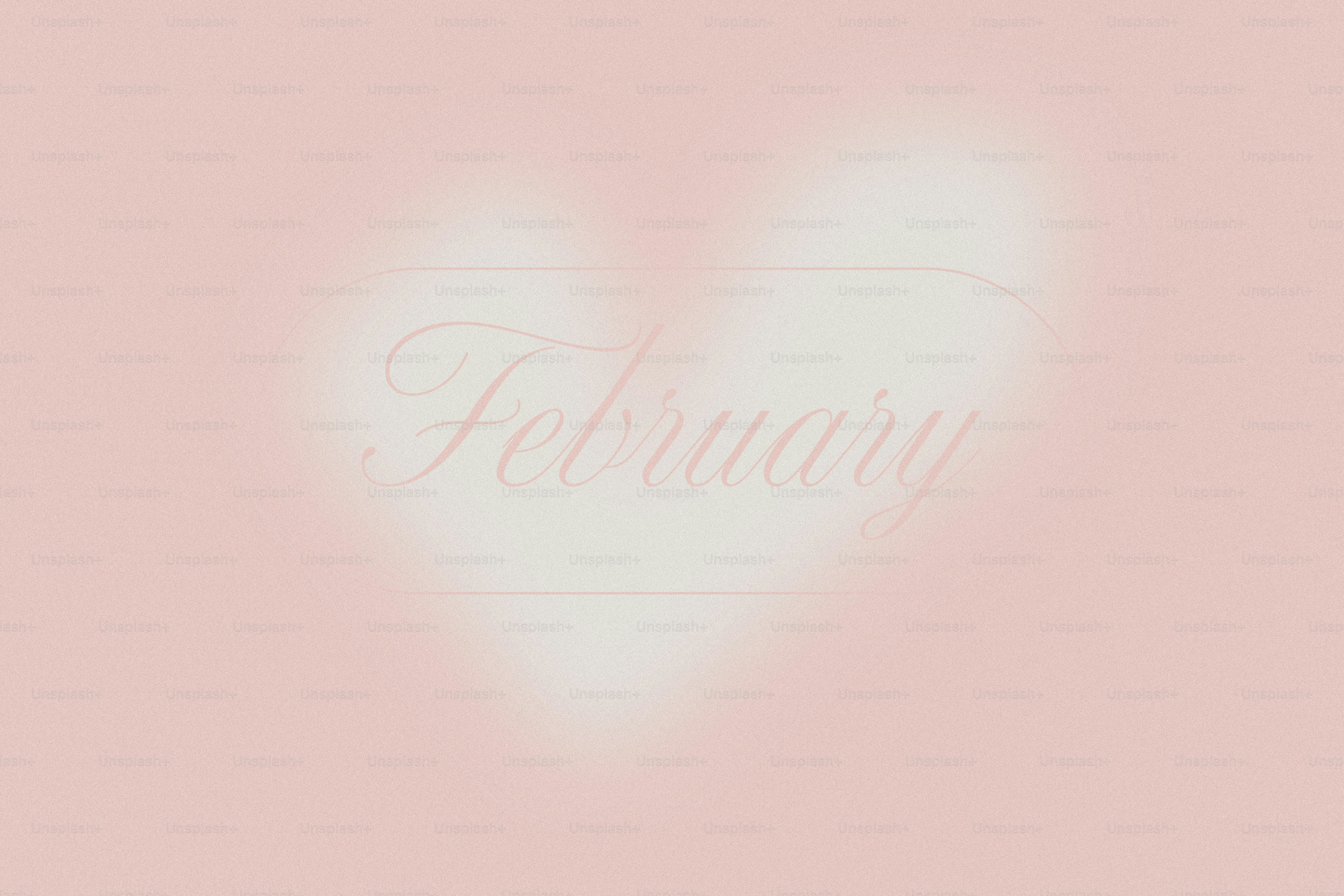 A soft pink heart with the word february inside.