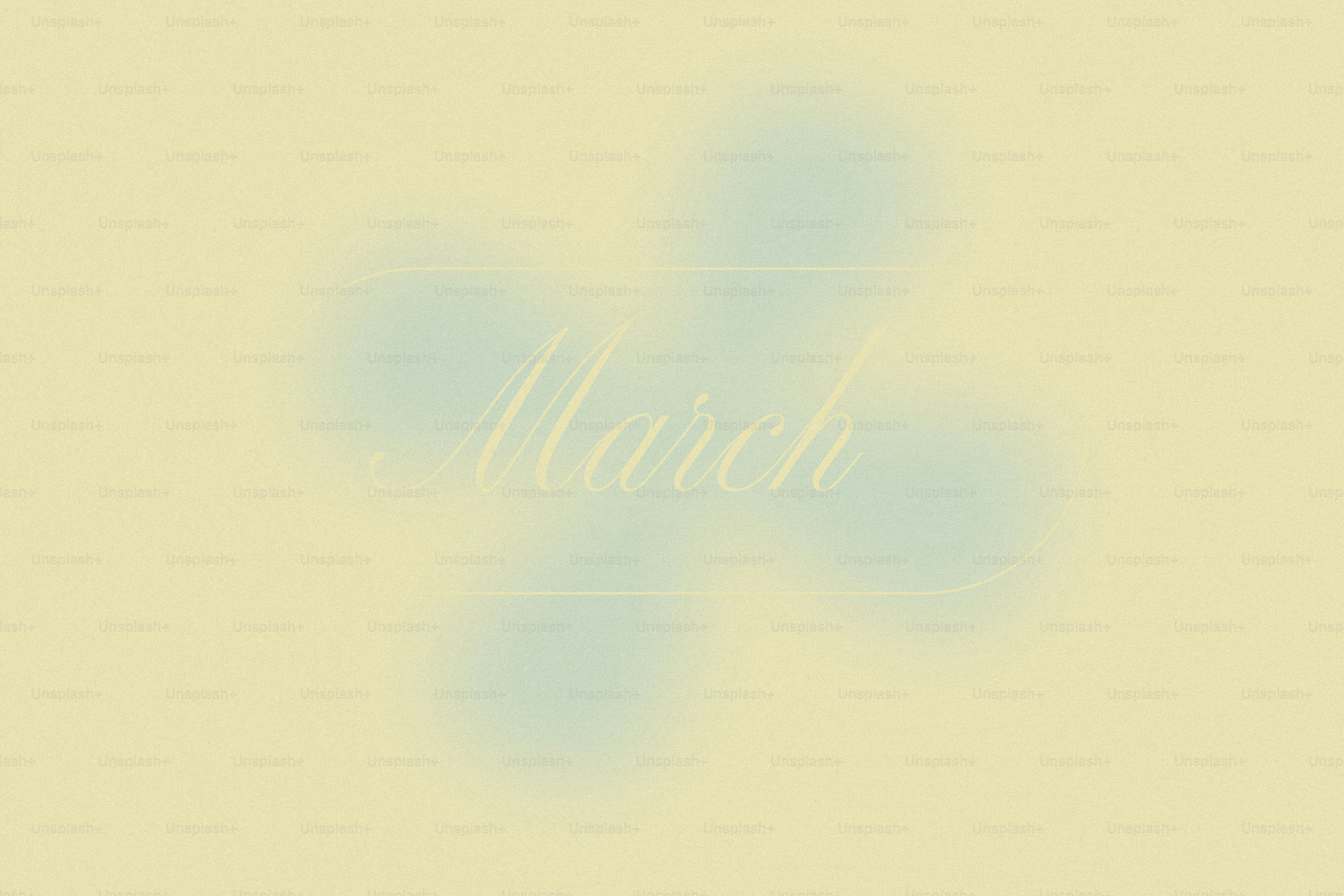 Soft, blurred pastel background with the word march.