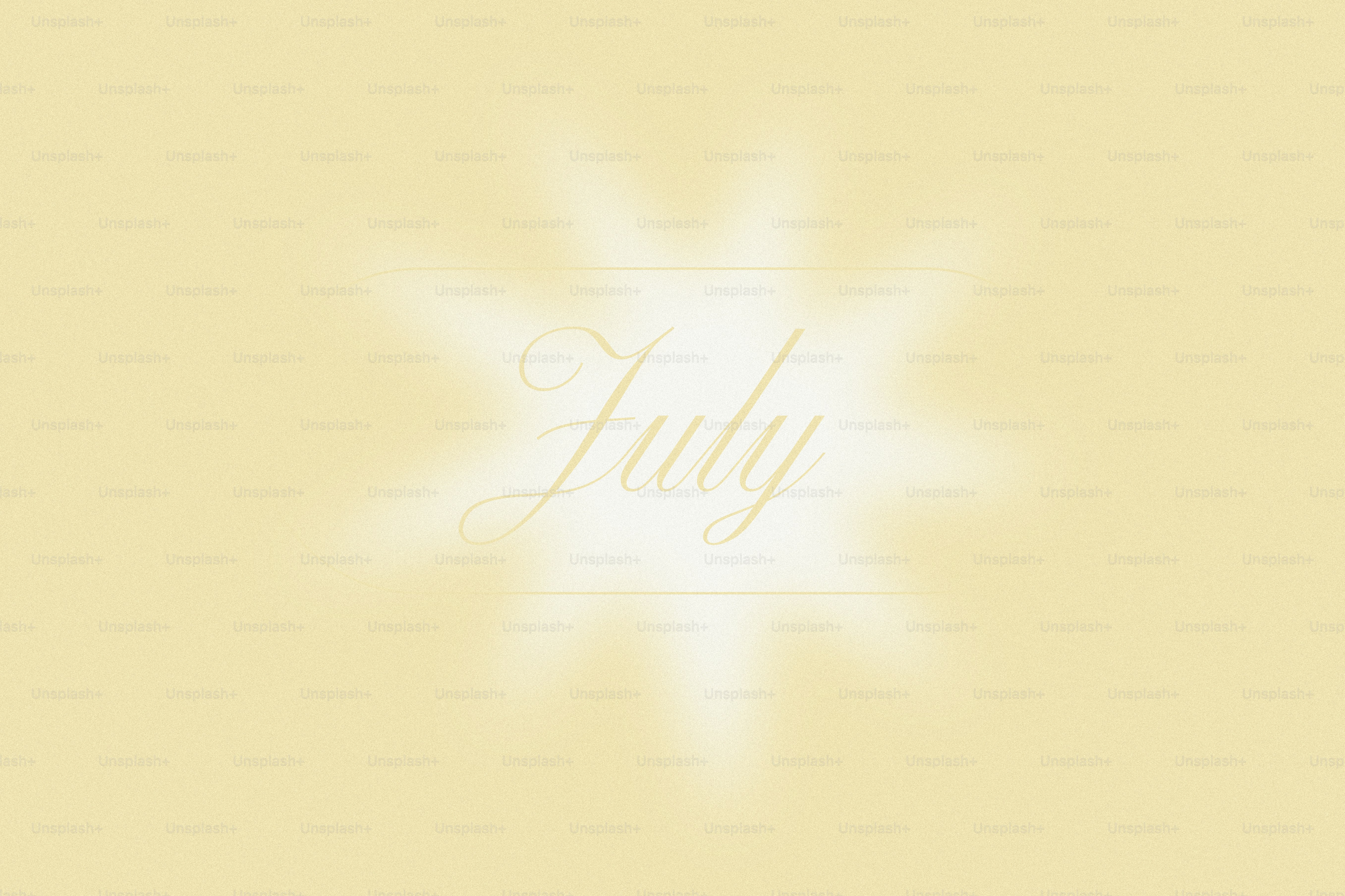 A soft yellow background with the word july.