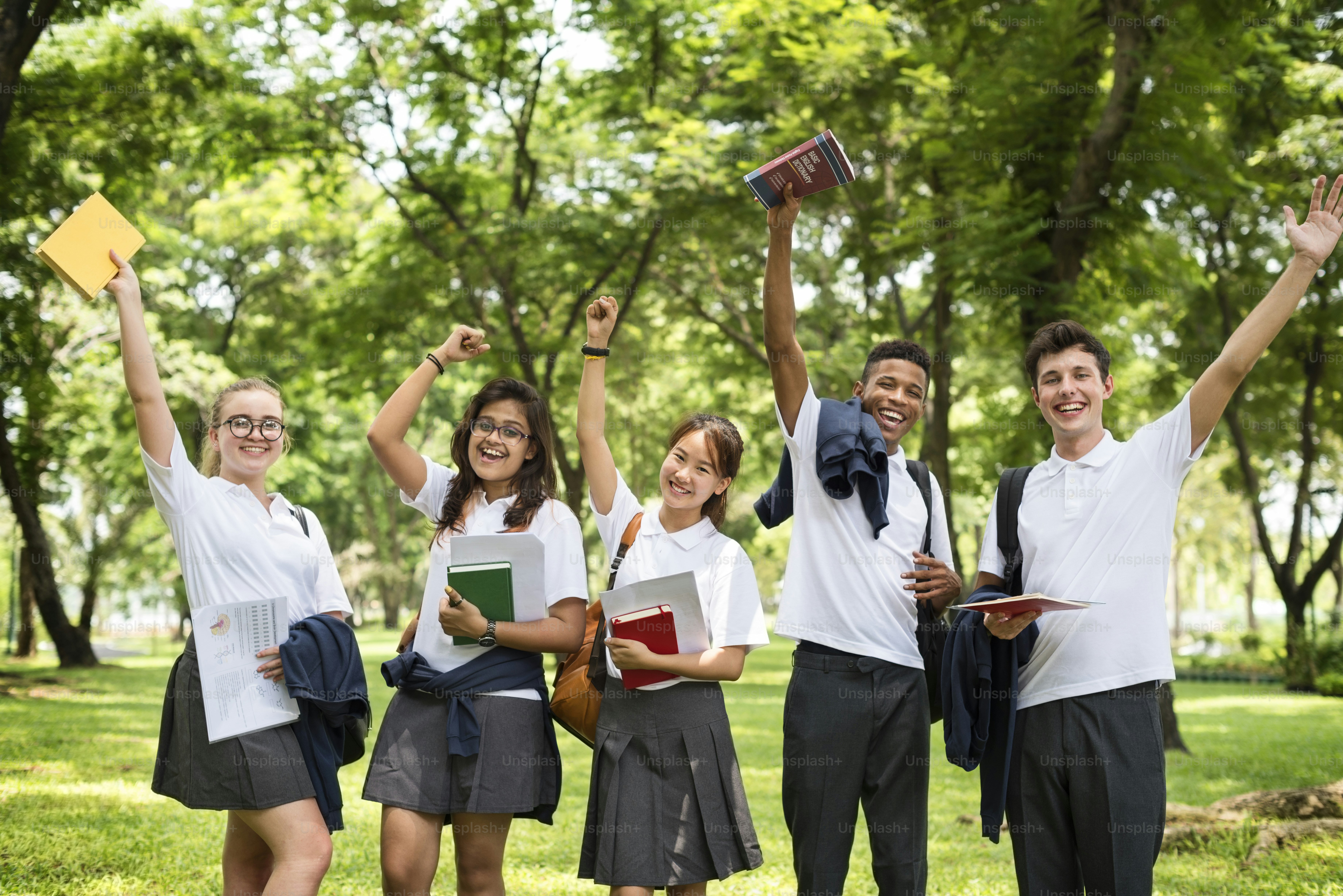 Students celebrating graduation on an international campus