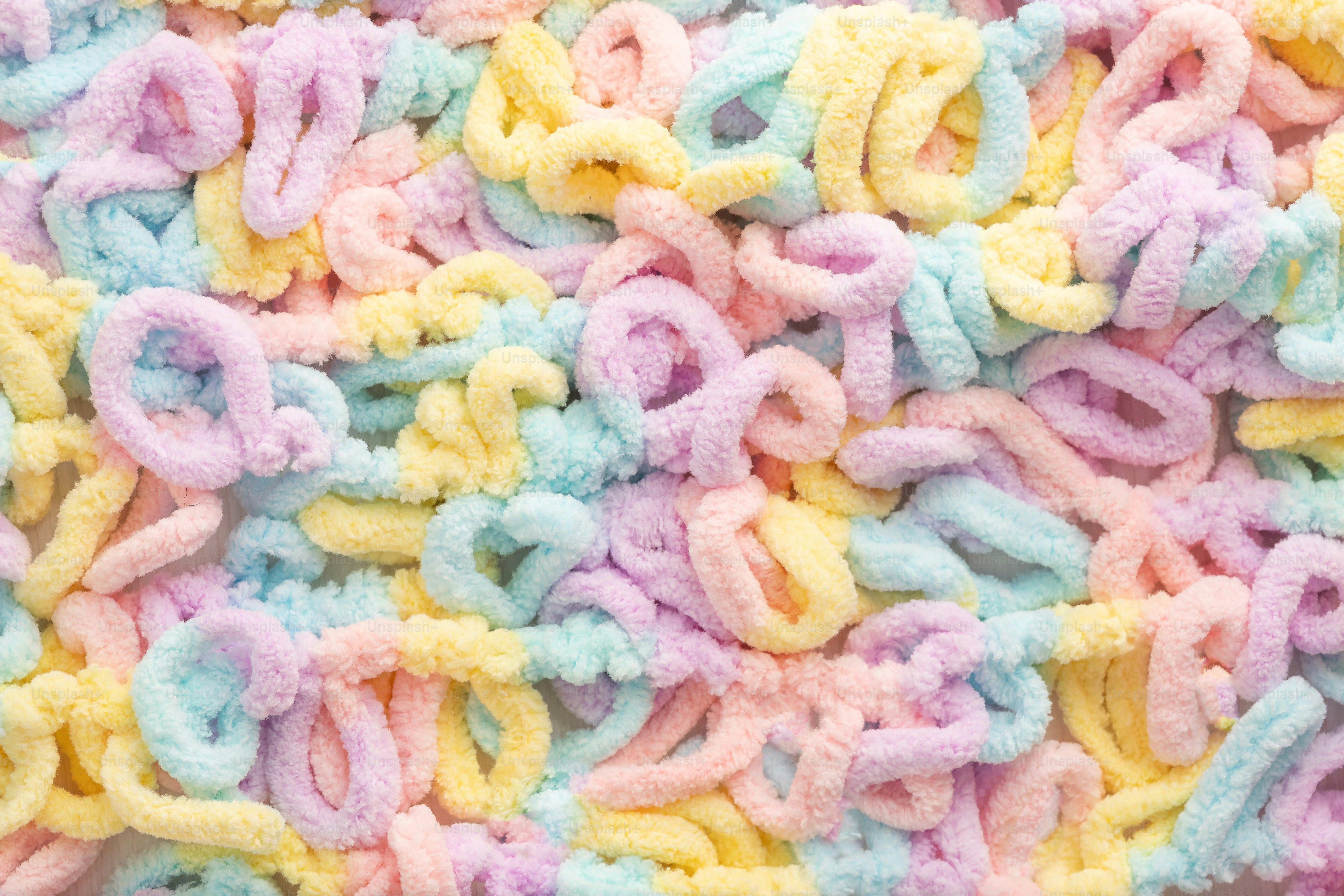Soft pastel yarn with loops in pastel colors photo – Background Image ...
