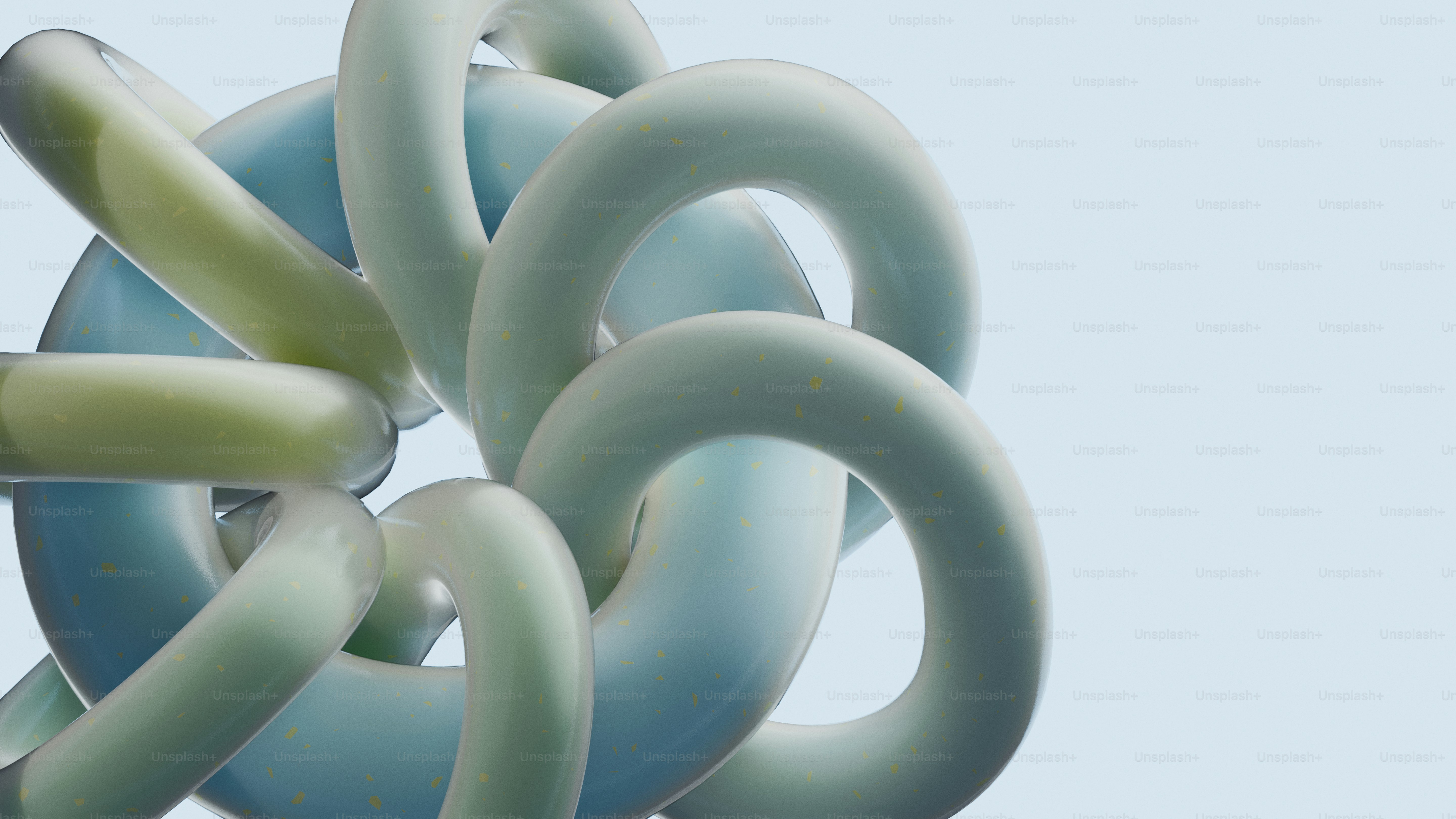 Abstract pastel torus shapes tangled together