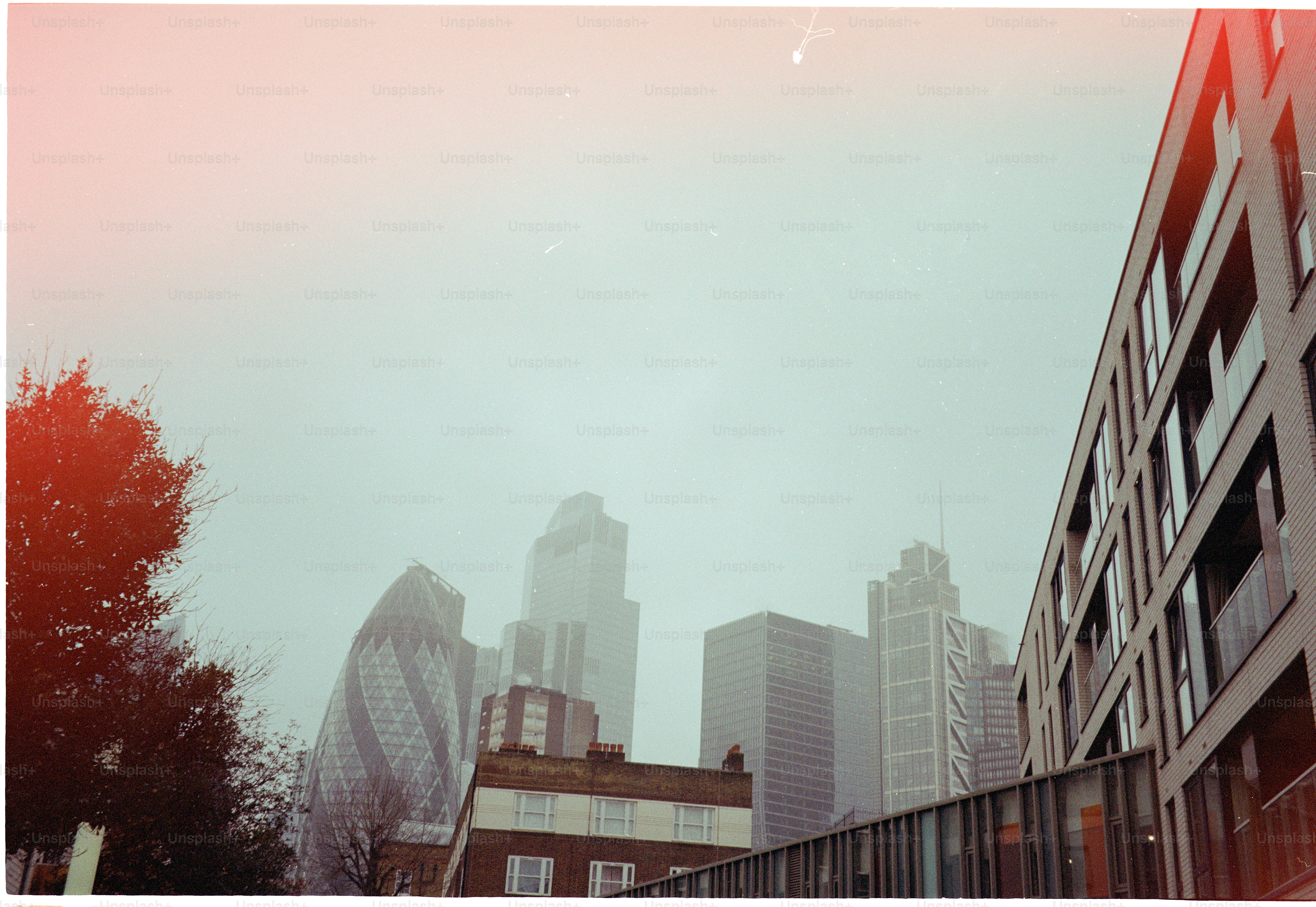Modern buildings and city skyline on a foggy day.
