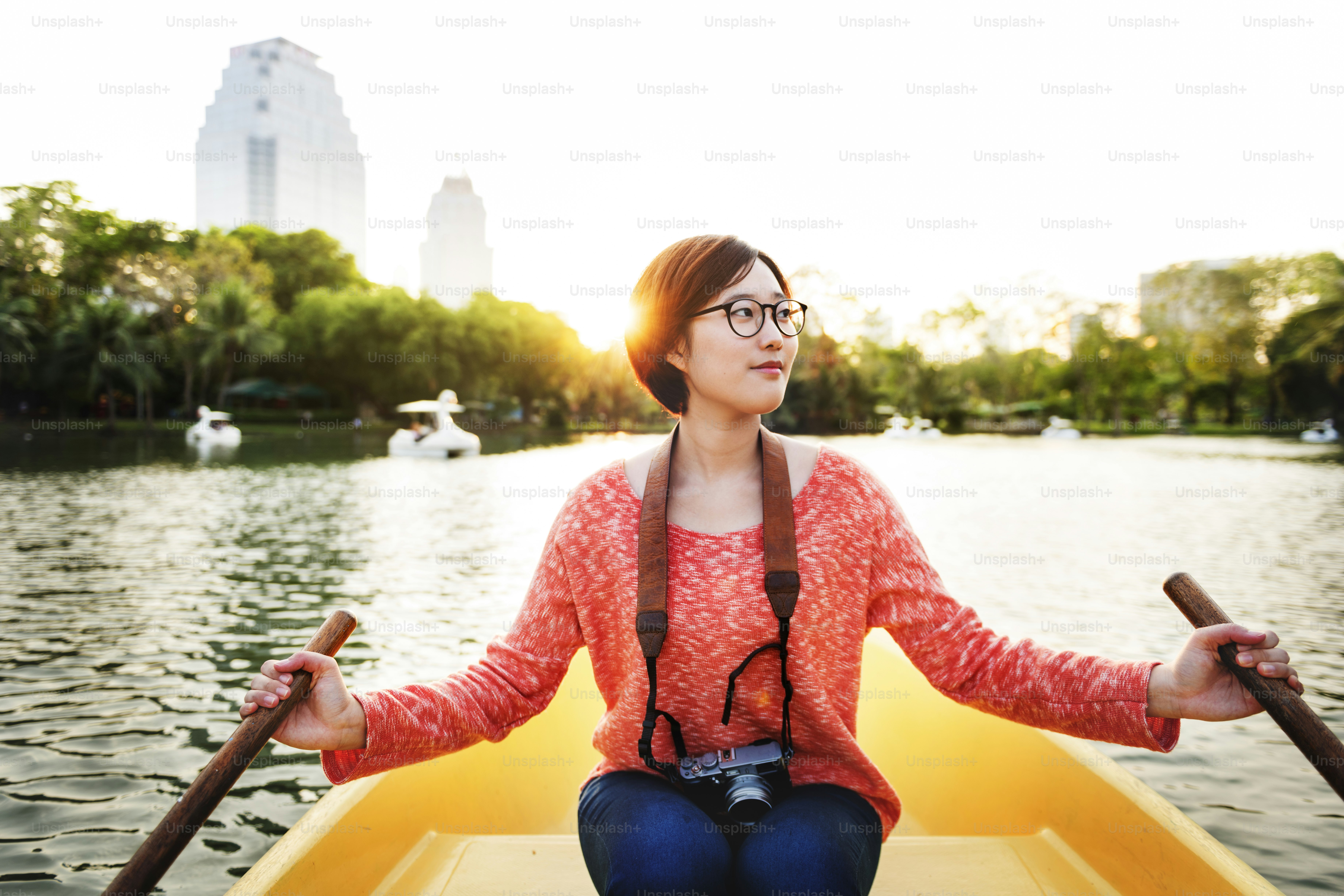 Asian Woman Ride On Boat Concept