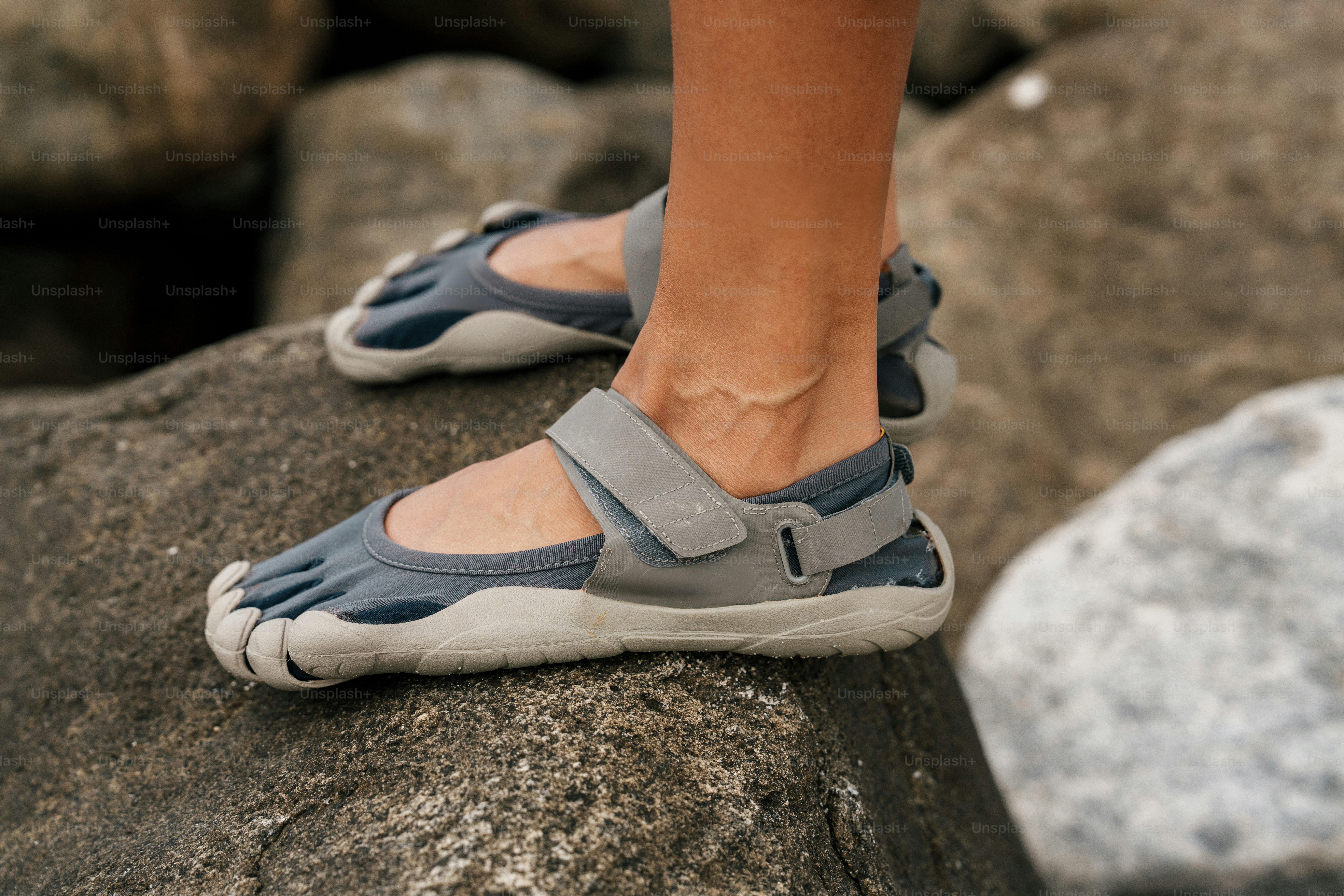 Barefoot shoes on rocks