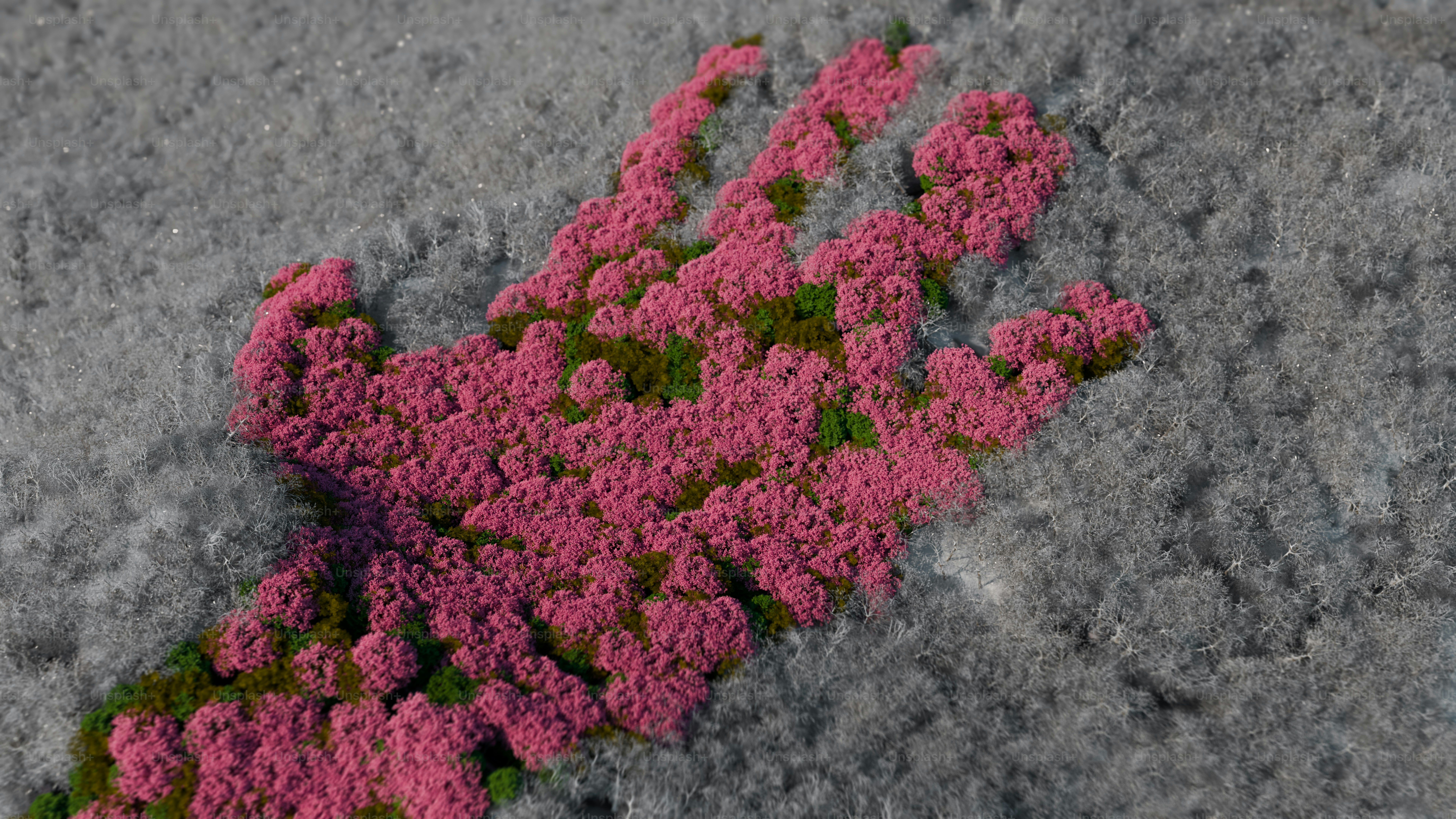 Pink flowers form a hand shape on gray ground.