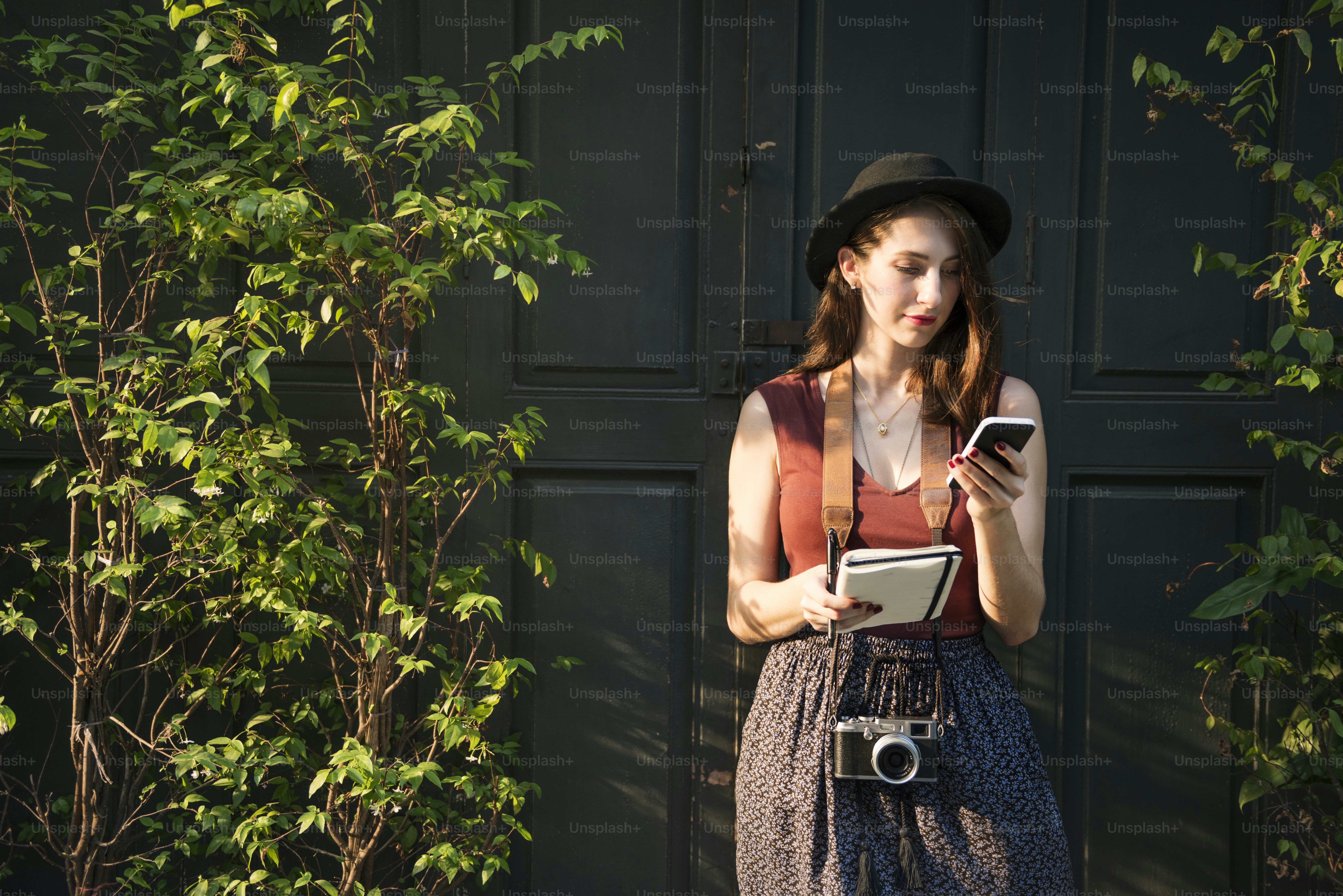 Woman Making Notes Outside City Concept photo – Woman Image on Unsplash