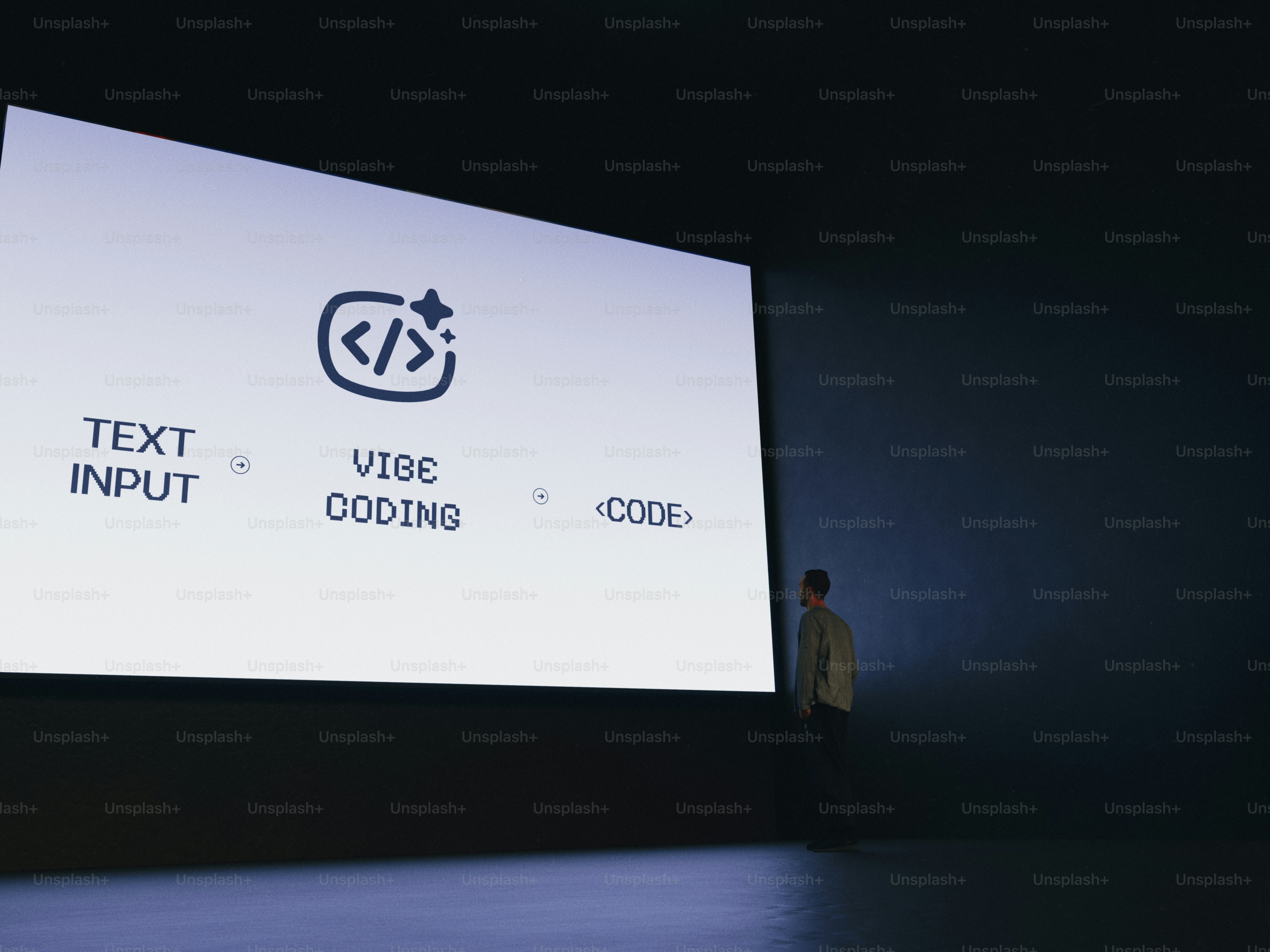 Man watches a presentation about vibe coding