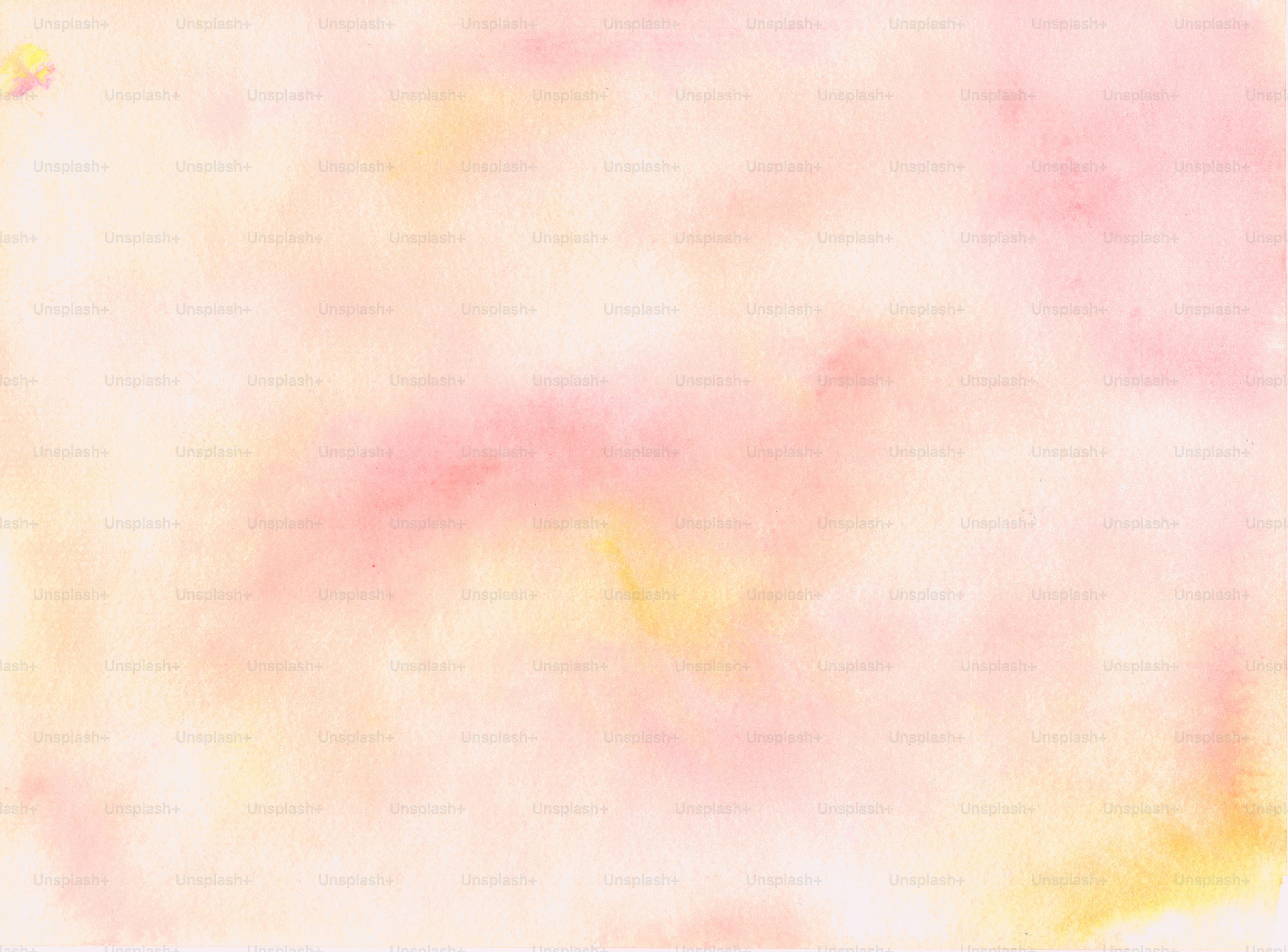 Sanfter rosa und gelber Aquarell-abstrakter Hintergrund.