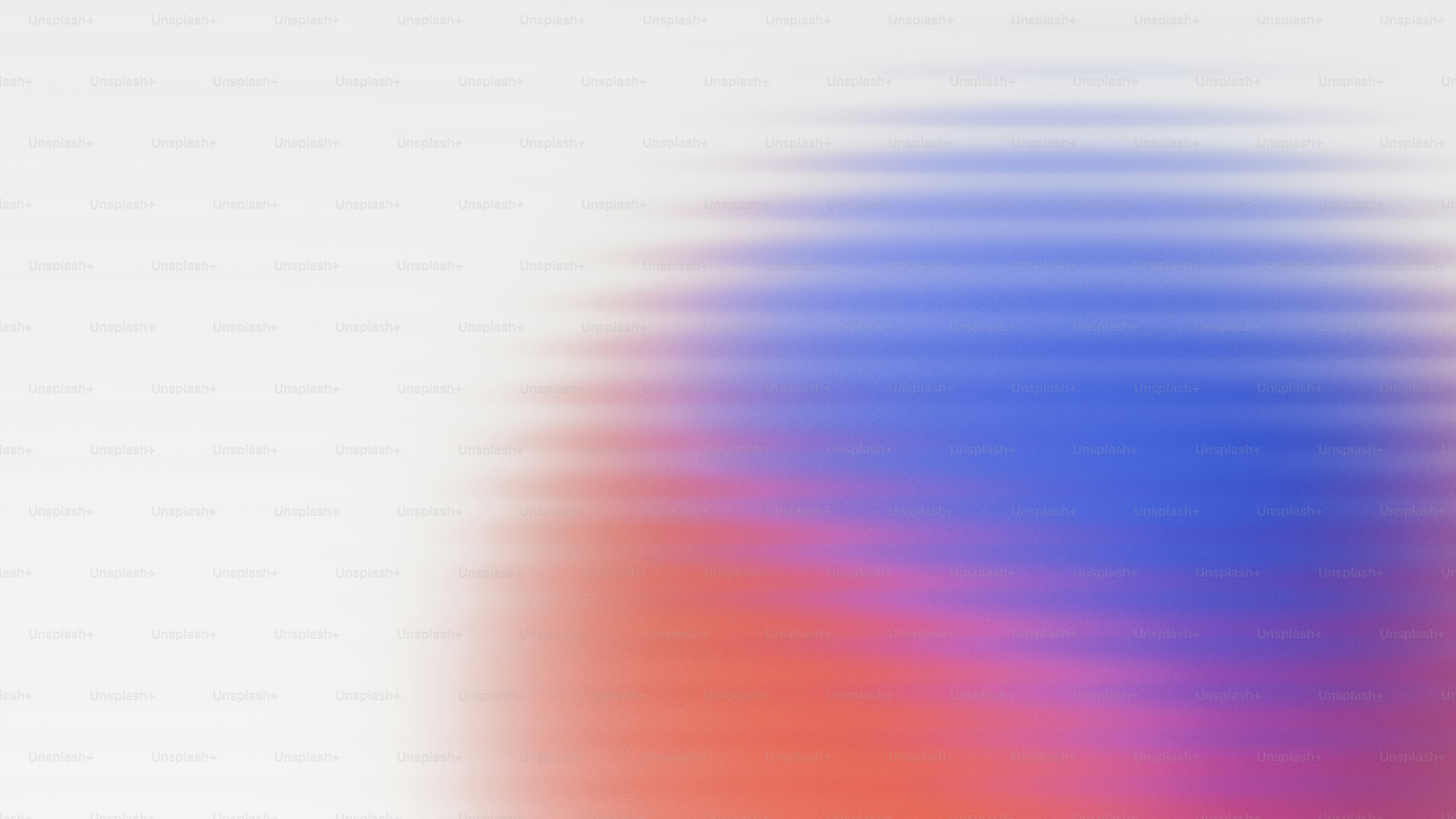 Abstract gradient of red, blue, and white colors