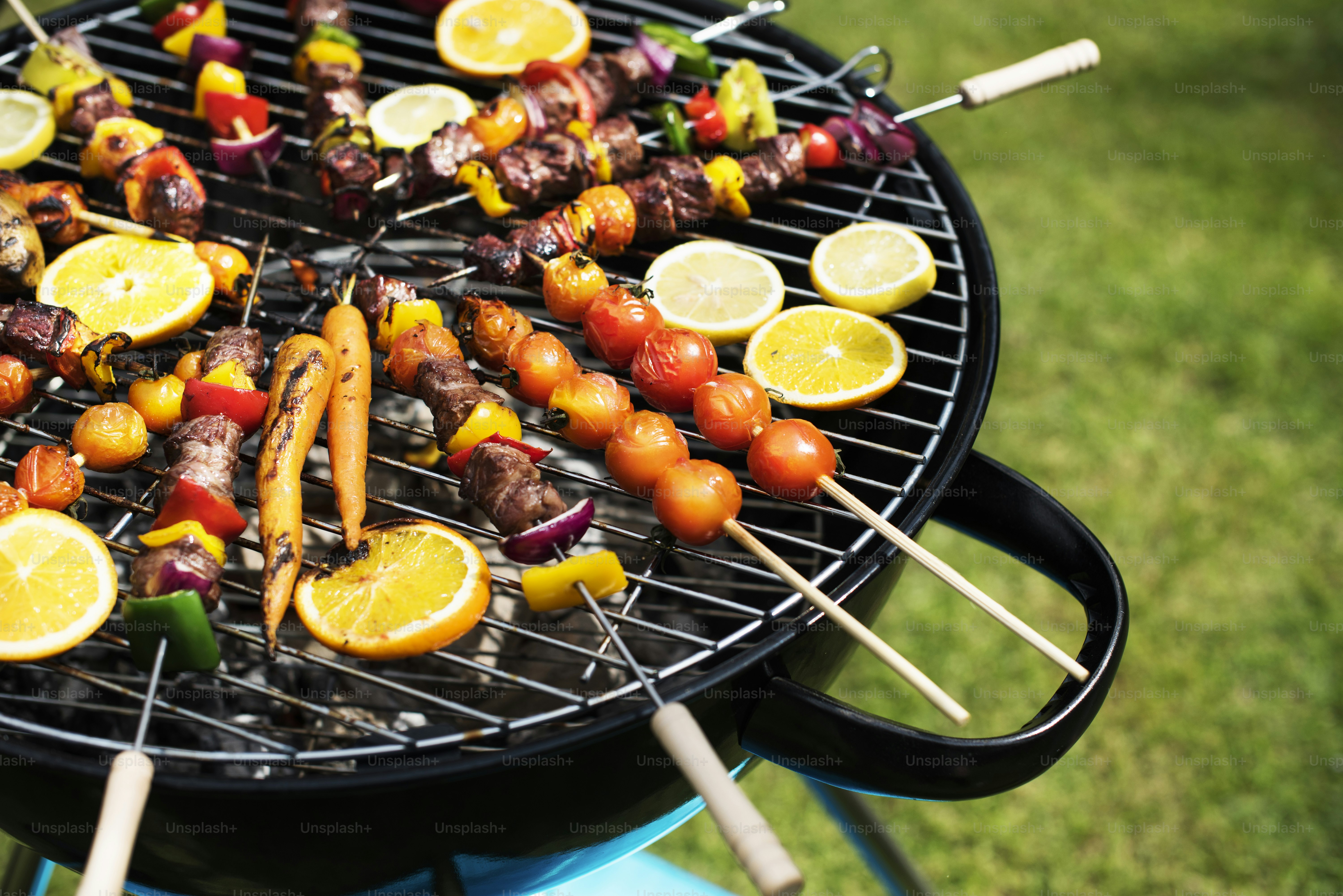 Closeup of barbecues steaks on the charcoals grill