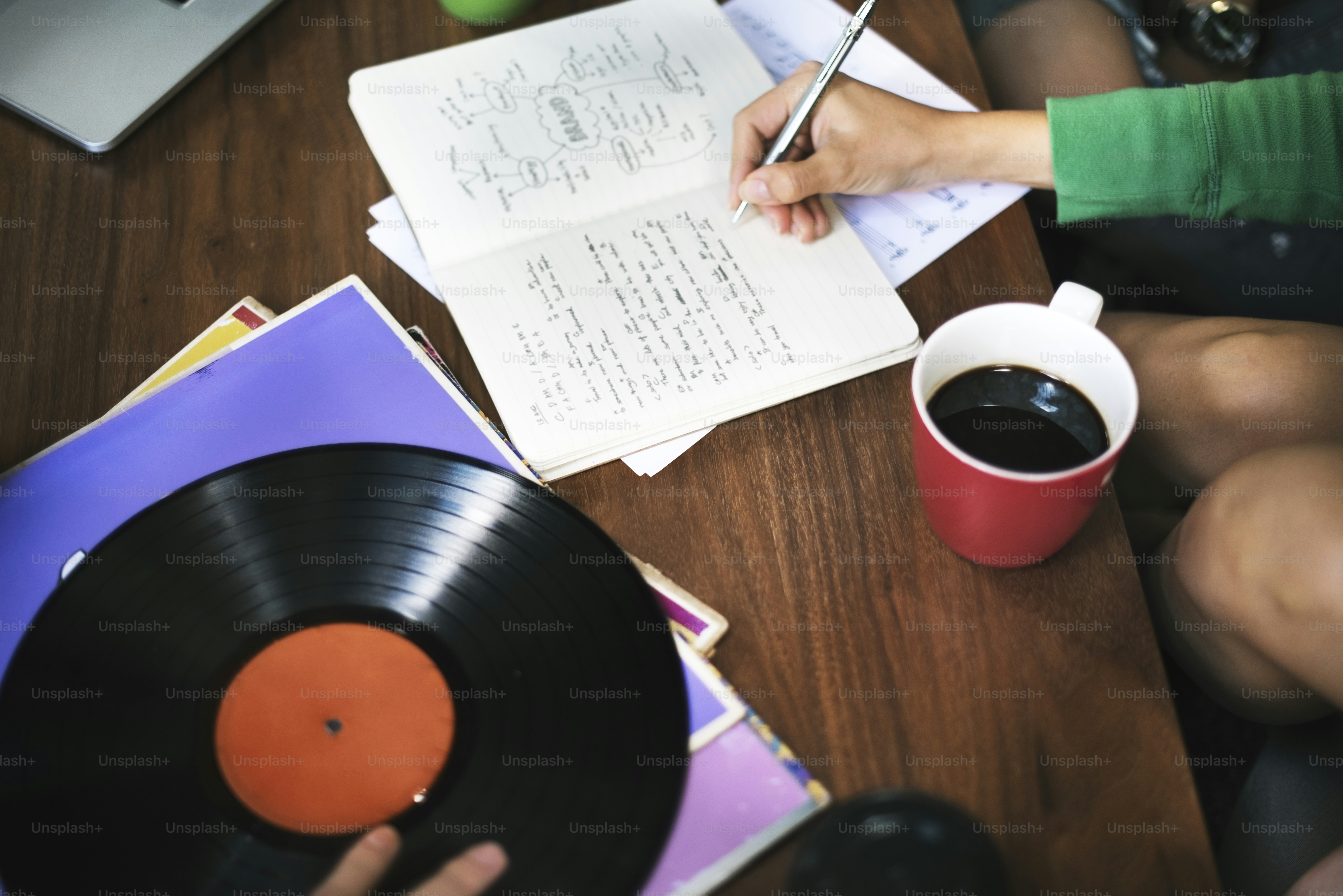 Human Hand Writing Notebook Vinyl Record Music Concept photo – Coffee ...