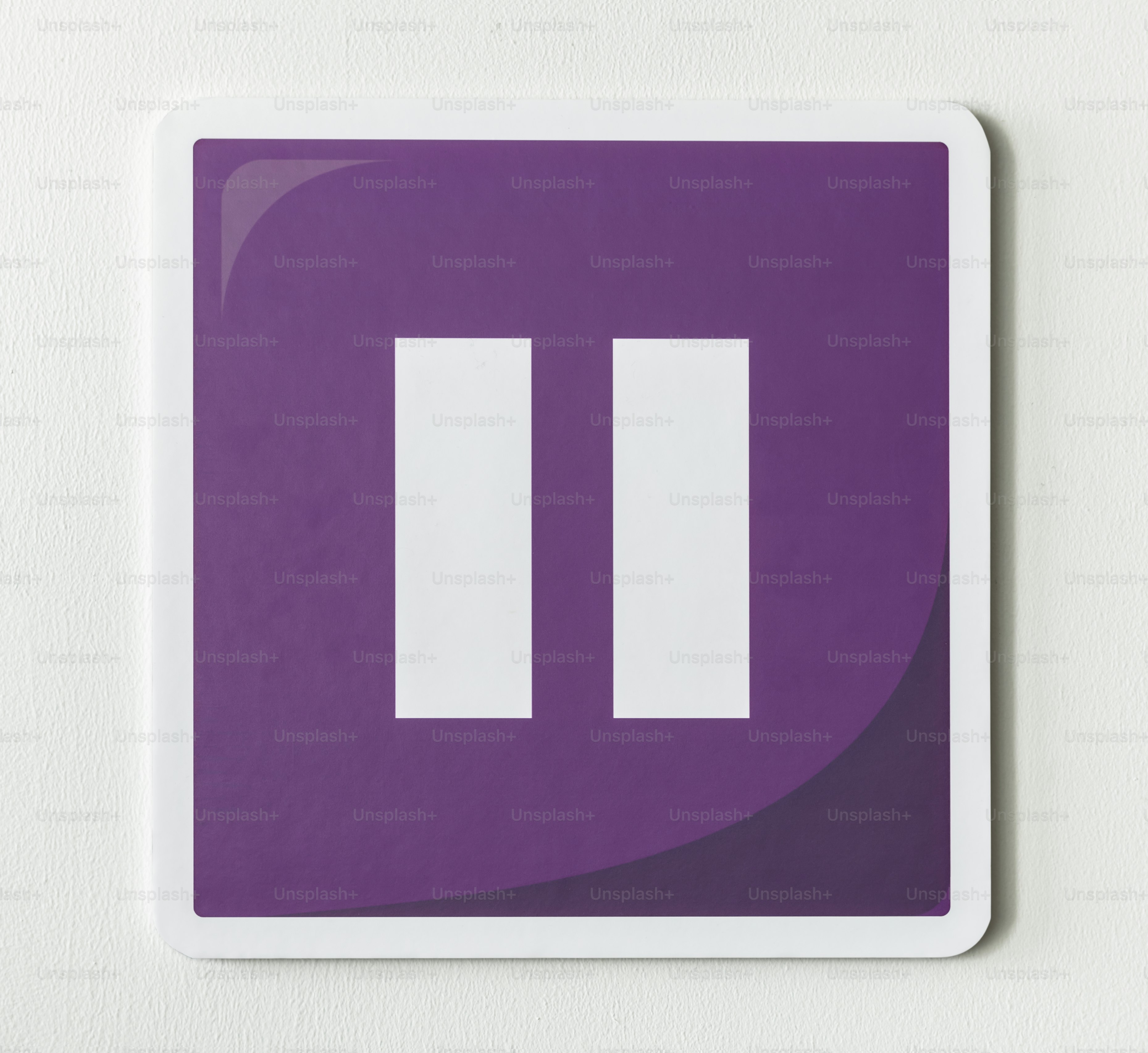 Purple pause button music icon