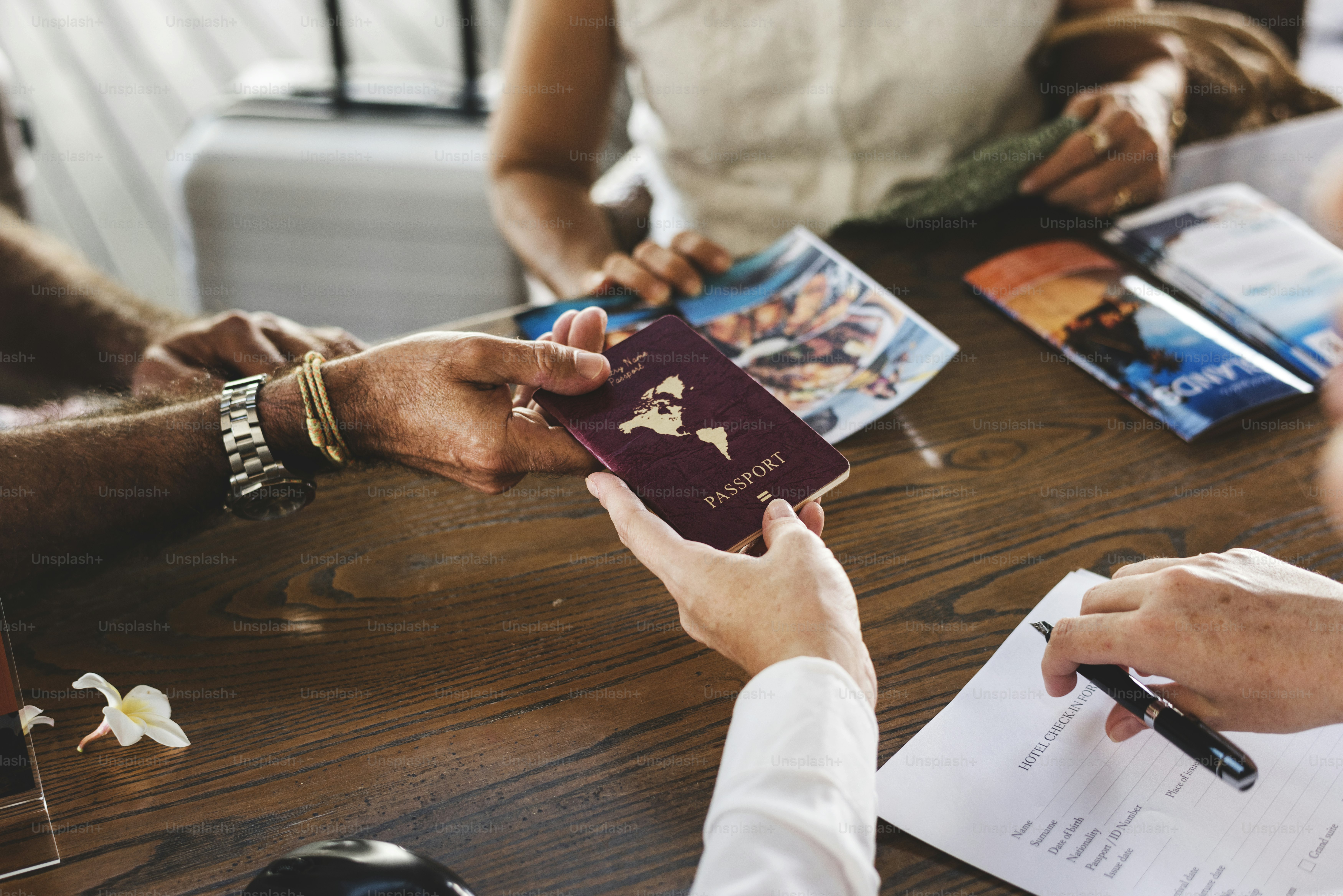 Traveler reviewing documents before using expedited visa processing at an airport terminal