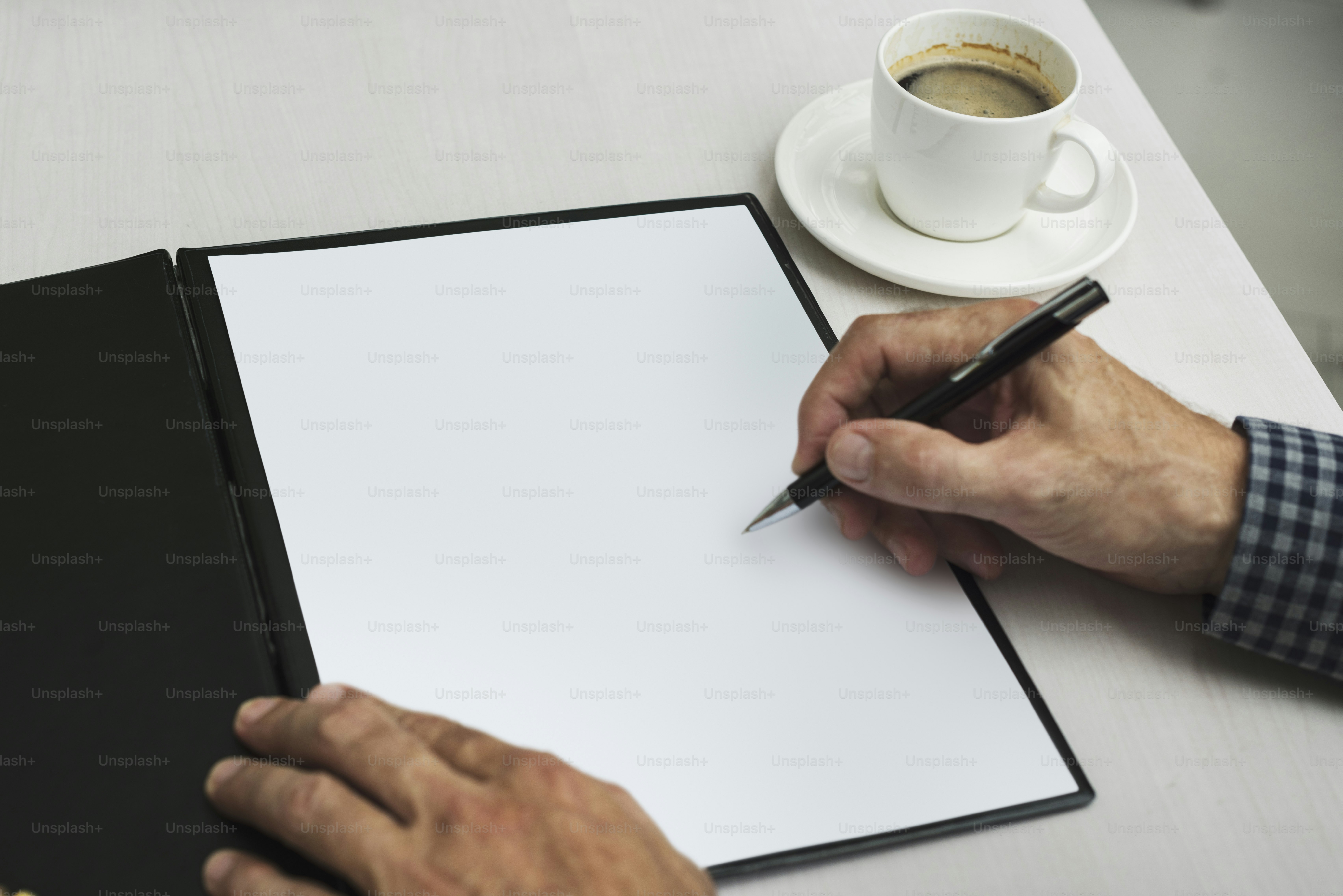 Hand signing blank document paper